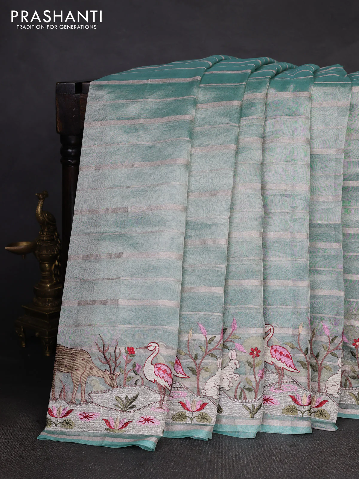 Pure tissue silk saree teal blue with allover silver zari strip pattern & beaded work and embroidery border - Image 2