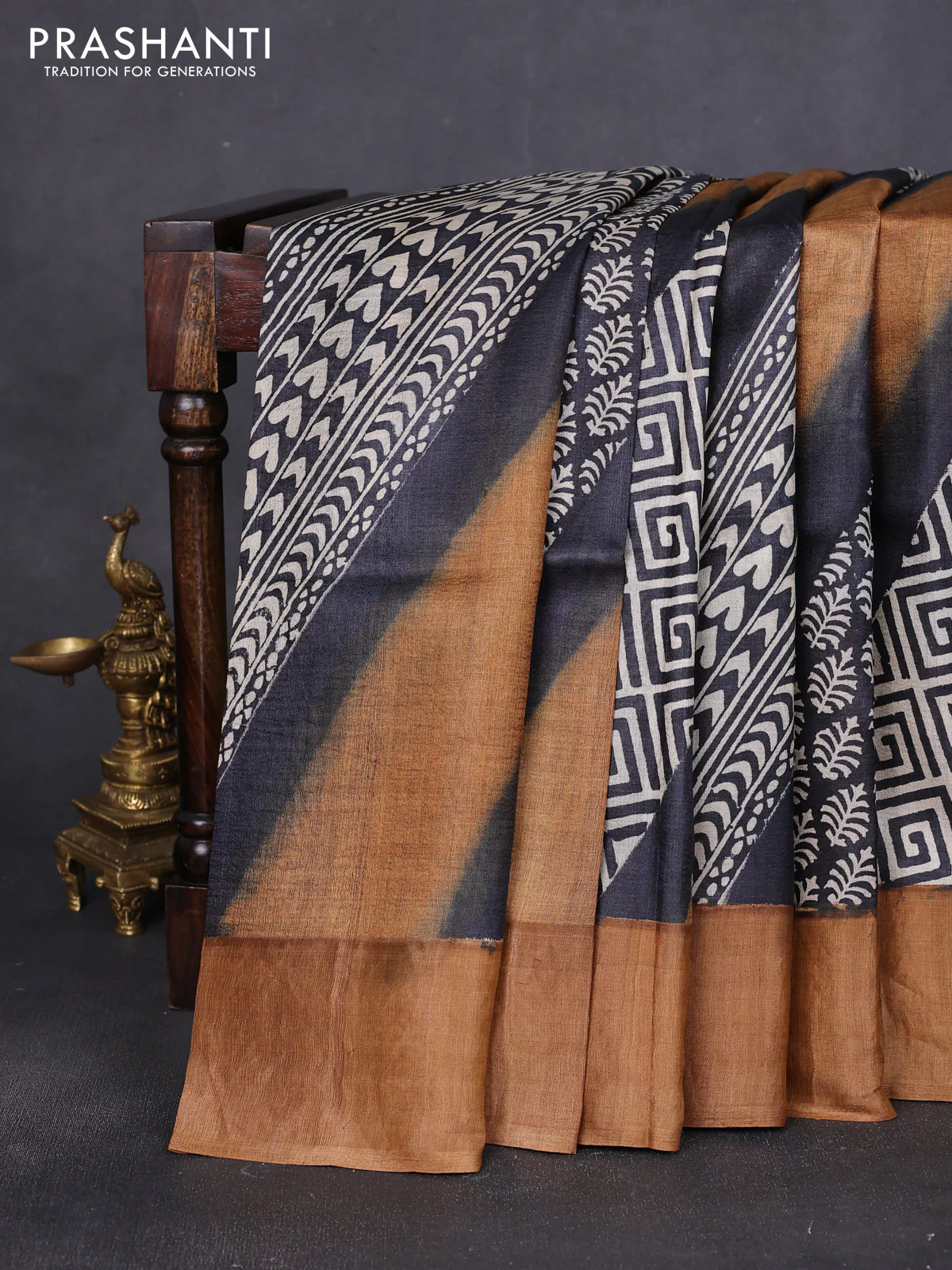 Pure tussar saree black and sandal with allover prints and zari woven border