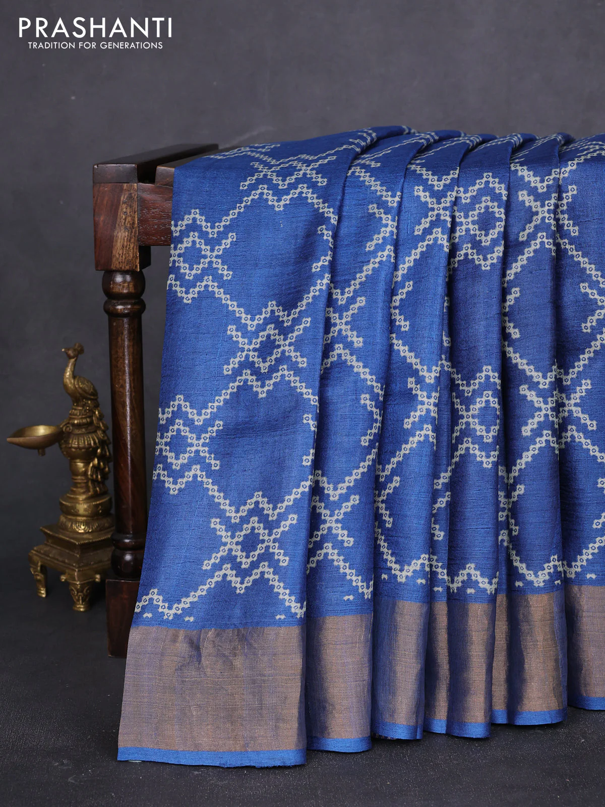 Pure tussar saree blue with allover prints and zari woven border