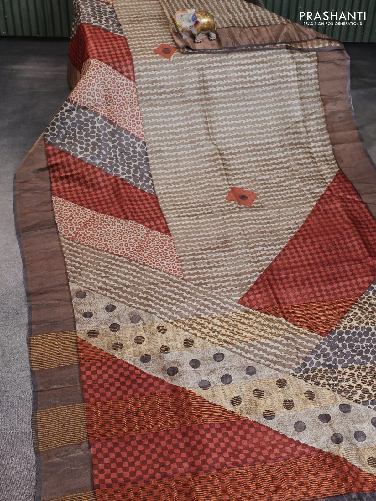 Pure tussar saree pastel brown and grey with allover geometric prints and zari woven border - Image 2