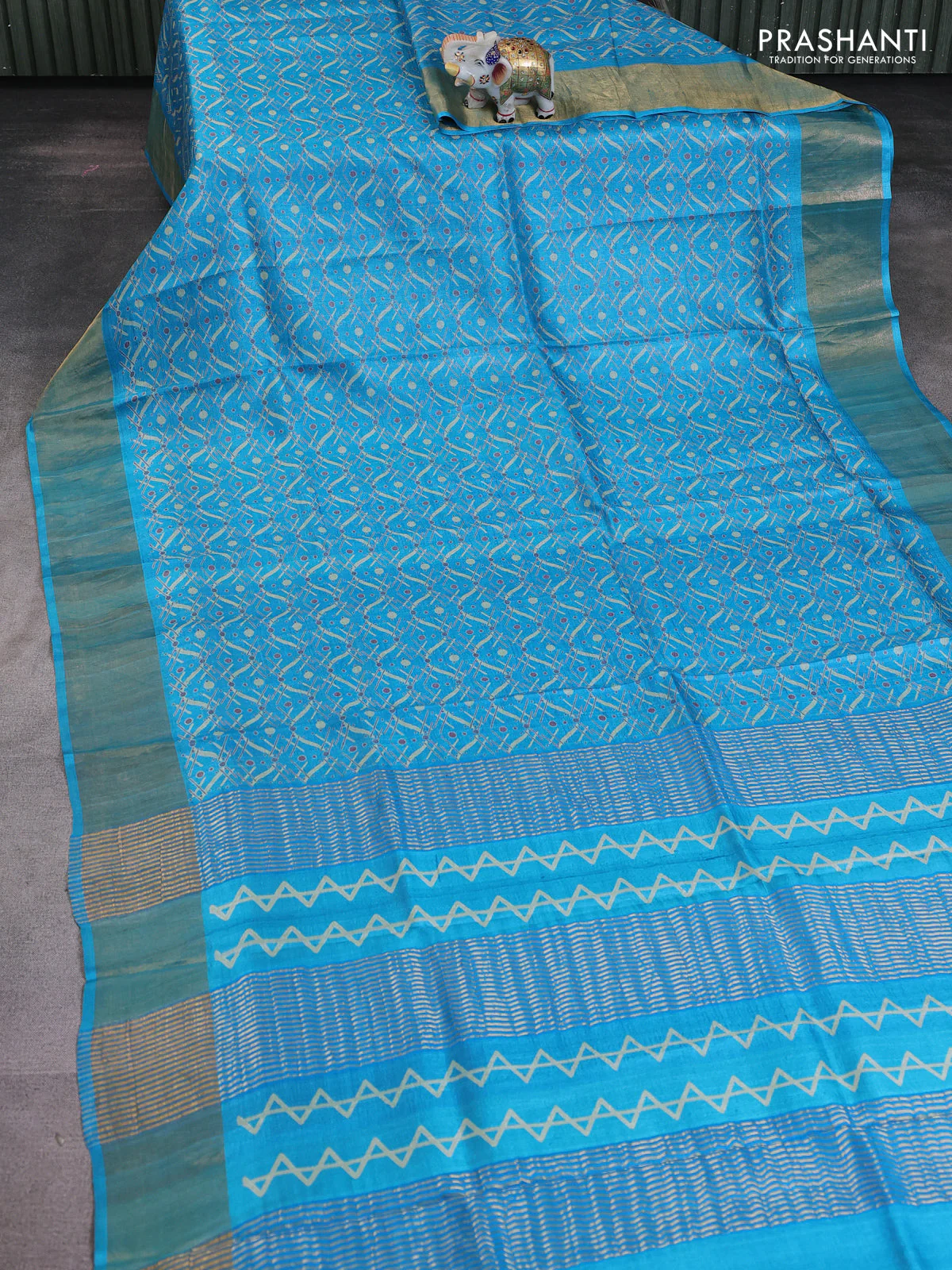 Pure tussar saree teal blue with allover prints and zari woven border - Image 2