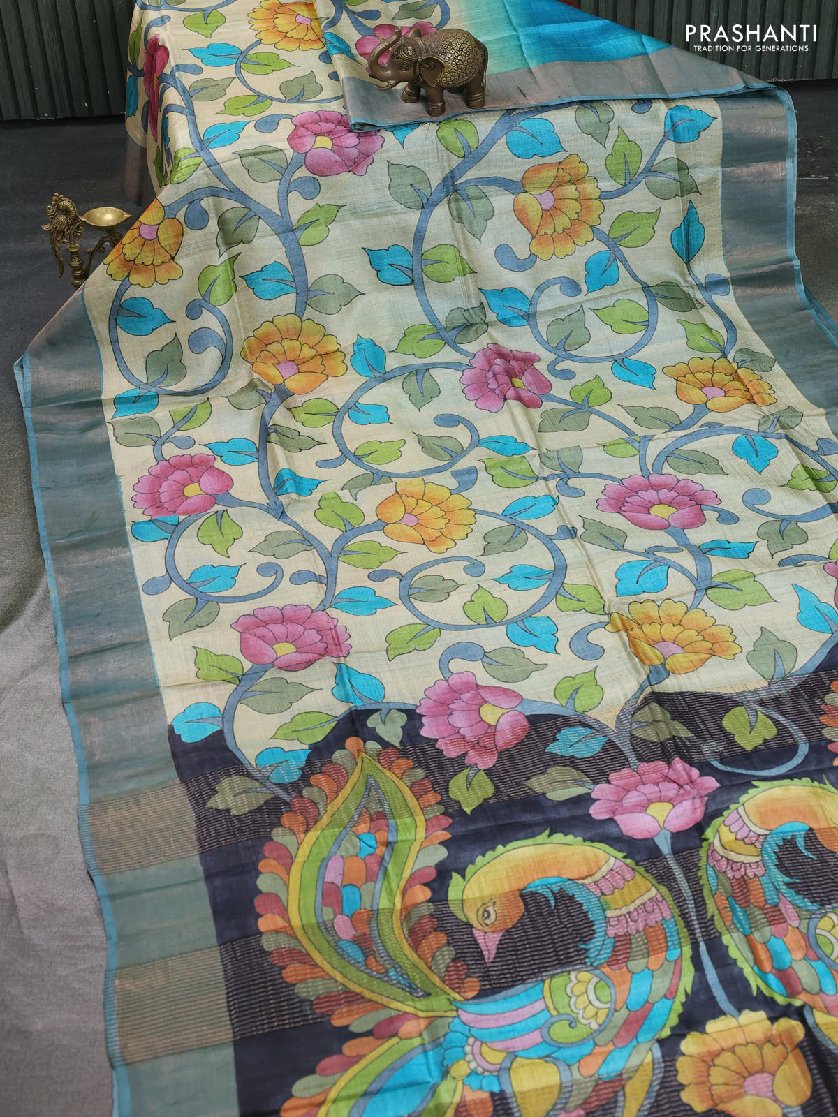 Pure tussar silk saree beige and pastel blue with allover hand painted prints and zari woven border - Image 2