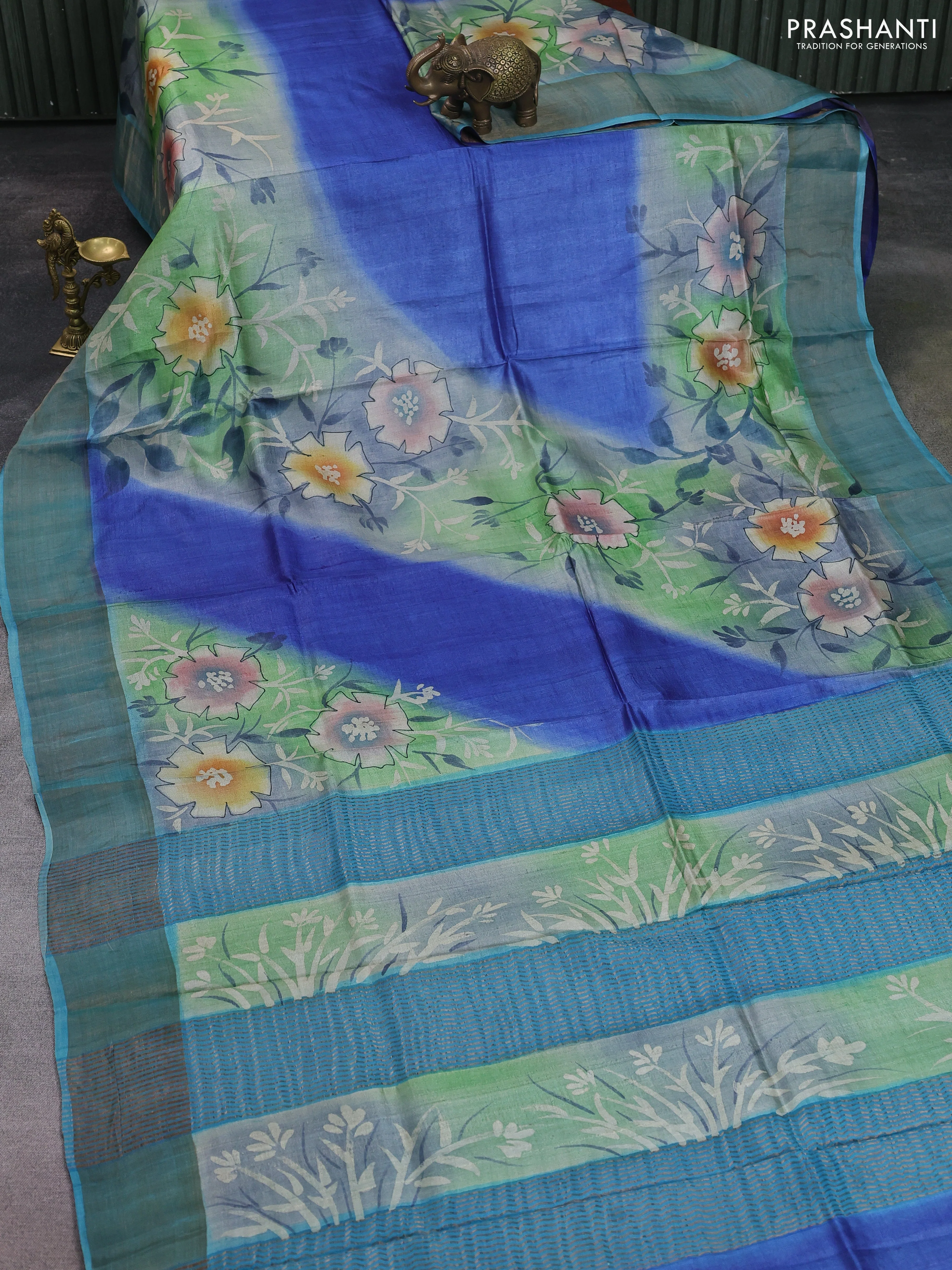 Pure tussar silk saree blue and teal green with allover hand painted prints and zari woven border - Image 2
