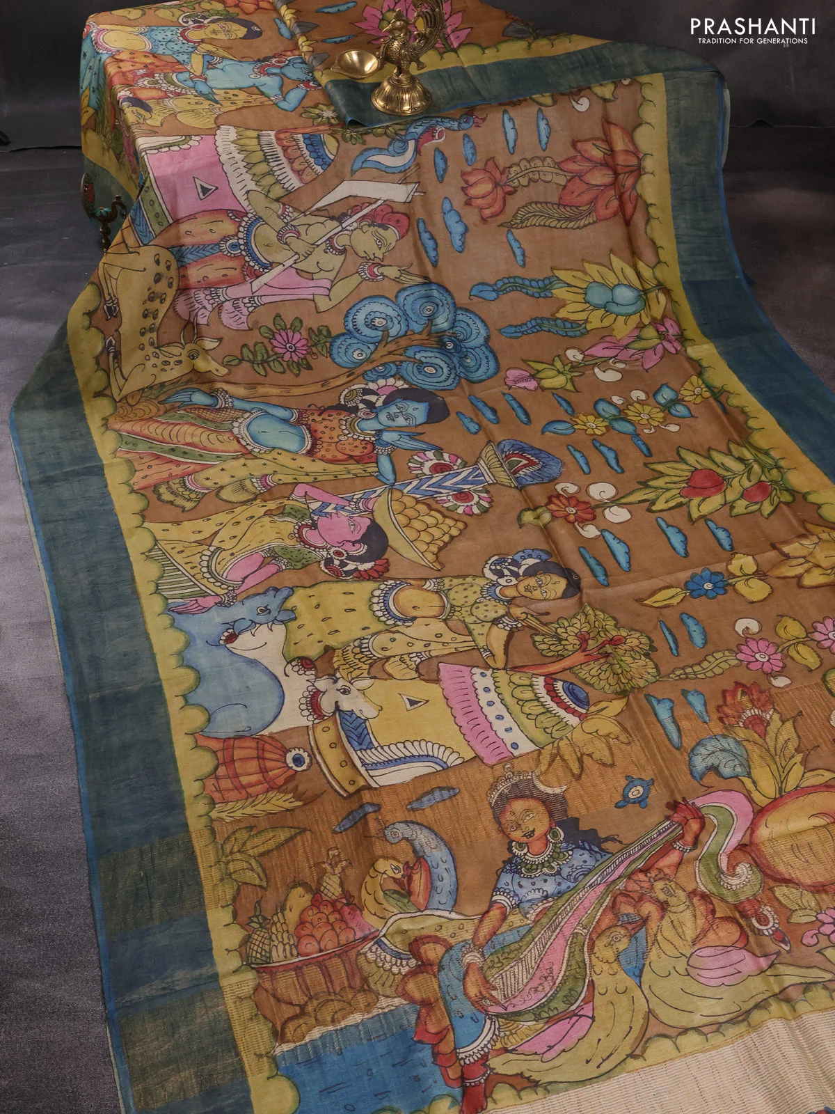 Pure tussar silk saree brown and peacock blue with allover pen kalamkari prints and zari woven border