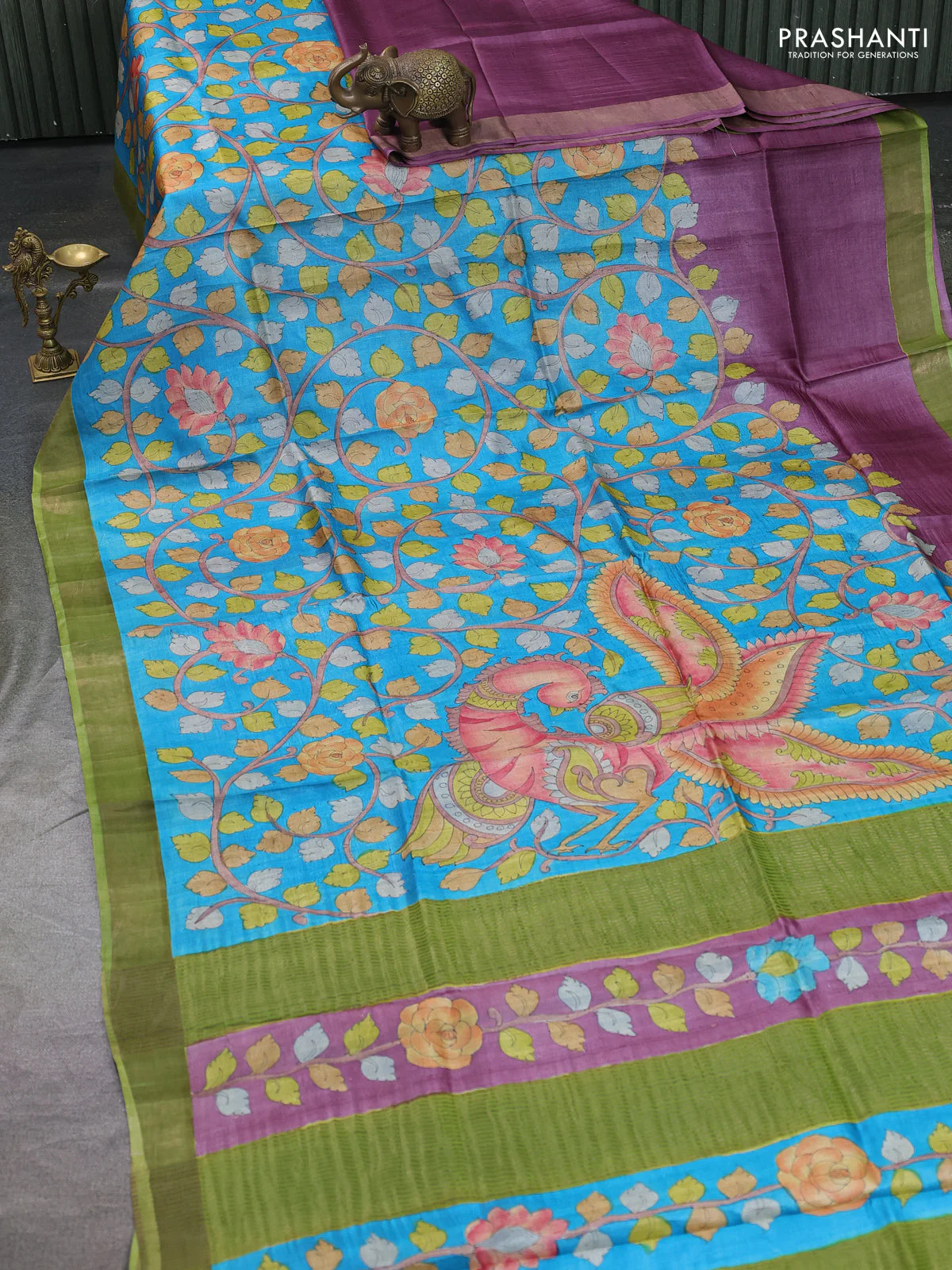 Pure tussar silk saree cs blue and light green with allover kalamkari hand painted prints and zari woven border - Image 2