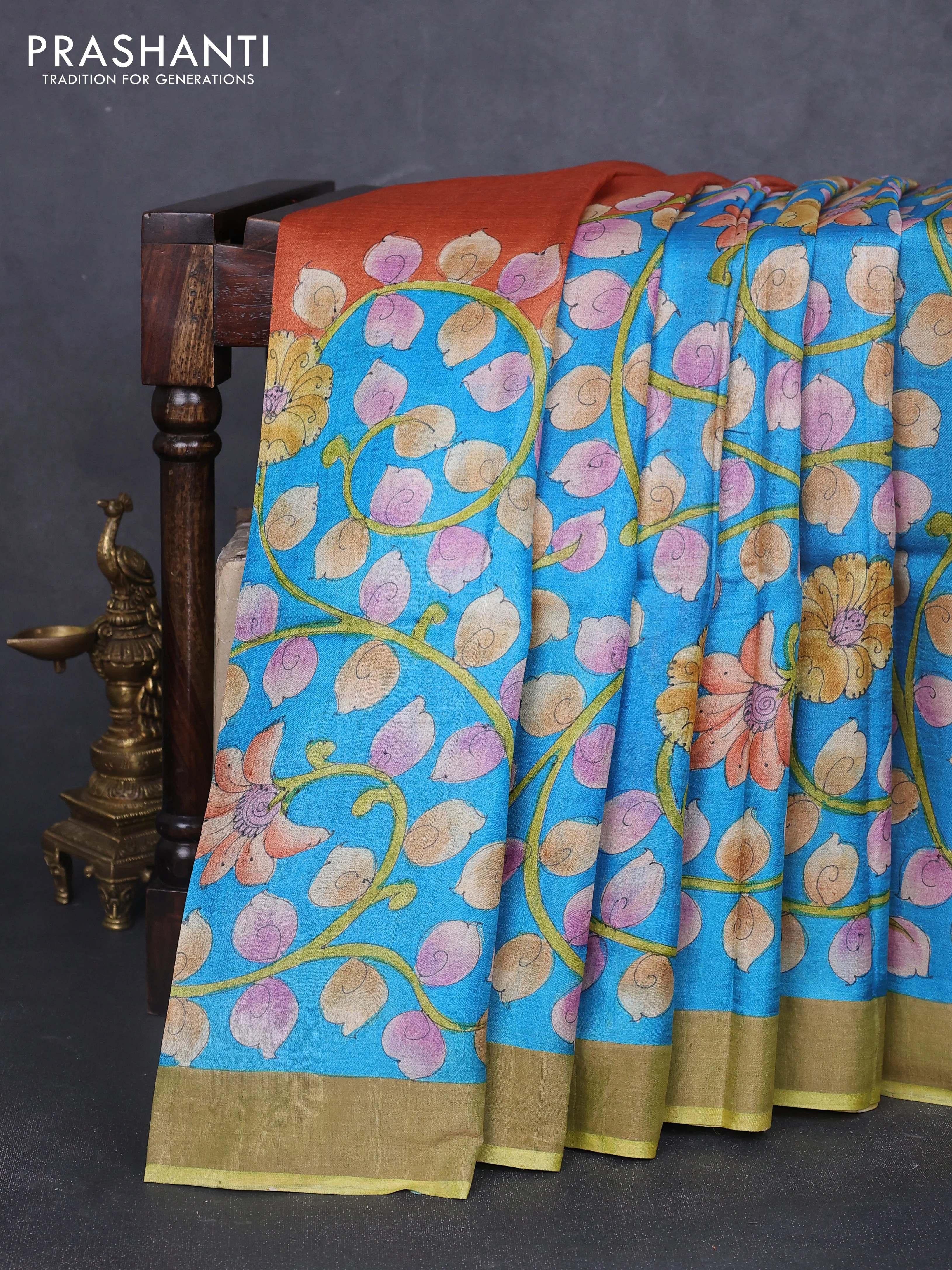 Pure tussar silk saree cs blue and mehendi green with allover kalamkari hand painted prints and zari woven border