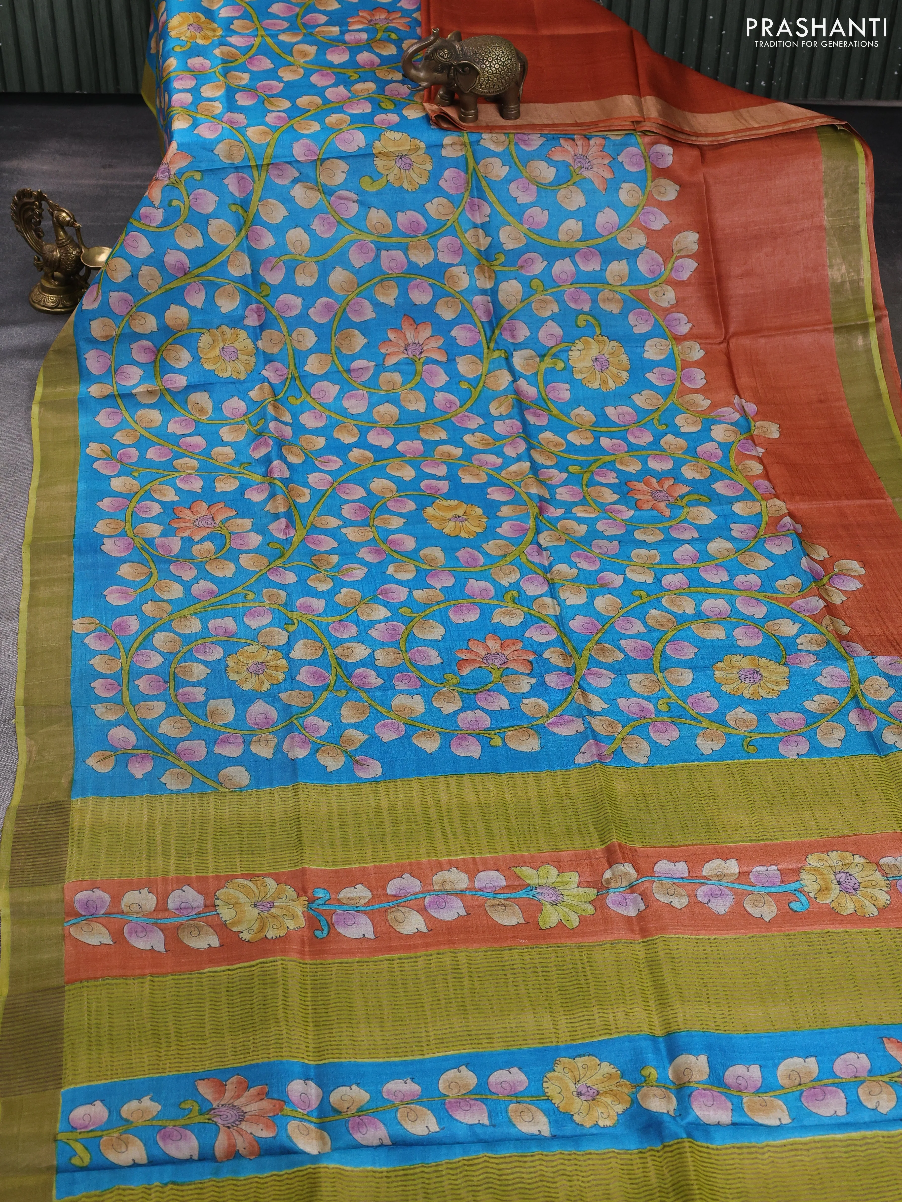 Pure tussar silk saree cs blue and mehendi green with allover kalamkari hand painted prints and zari woven border - Image 2