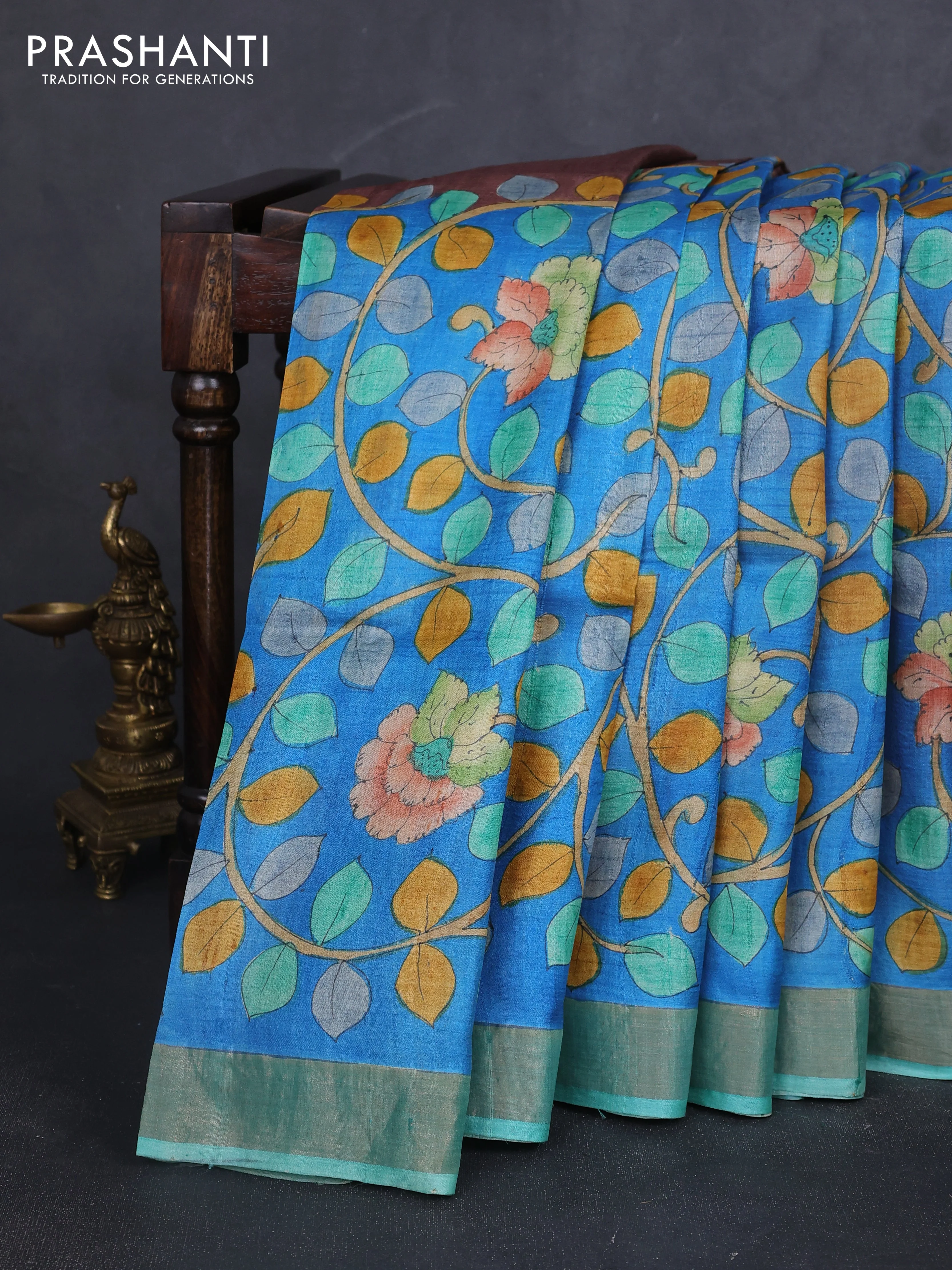 Pure tussar silk saree cs blue and teal green with allover kalamkari hand painted prints and zari woven border