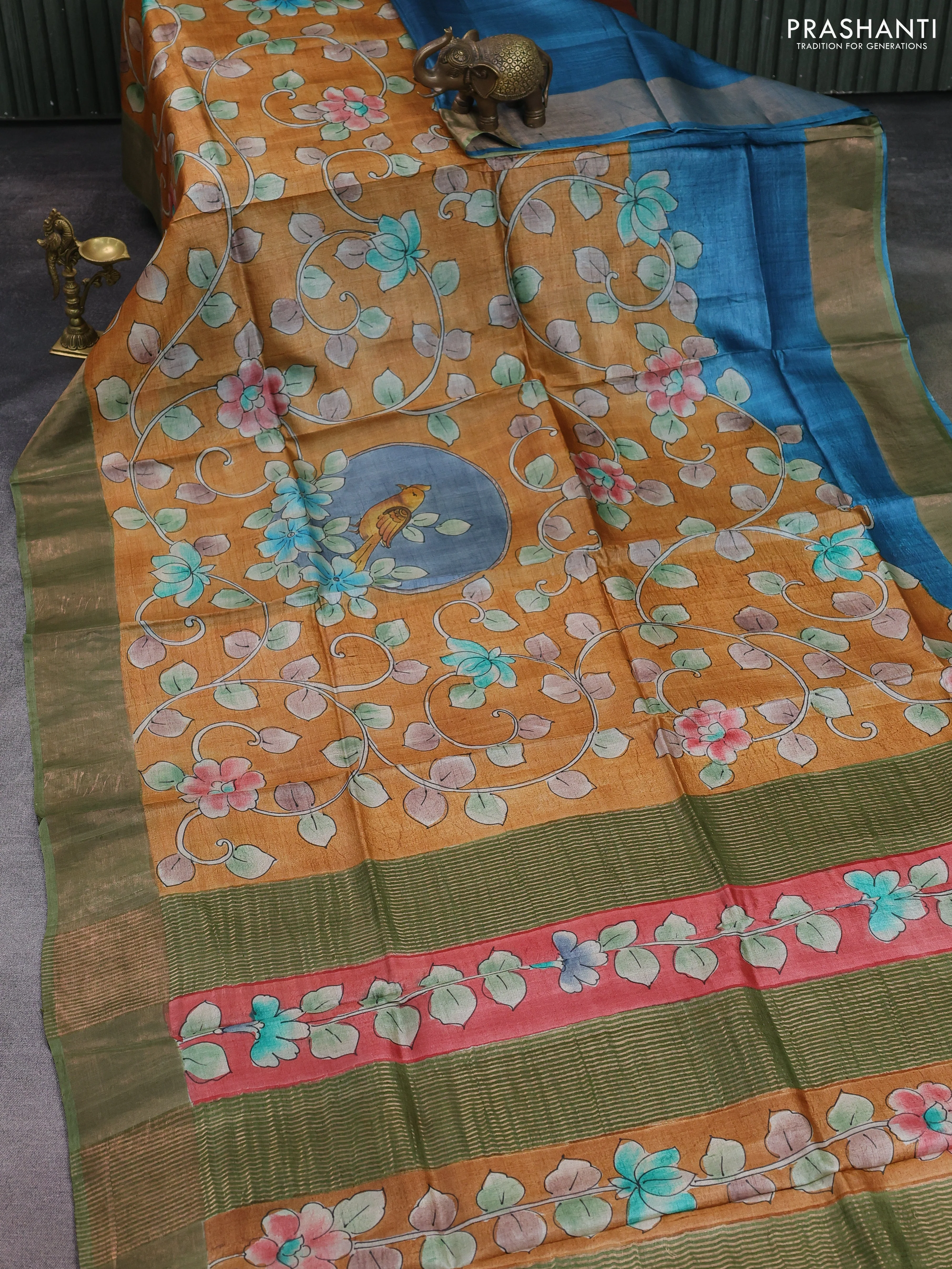 Pure tussar silk saree dark sandal and pastel green with allover kalamkari hand painted prints and zari woven border - Image 2