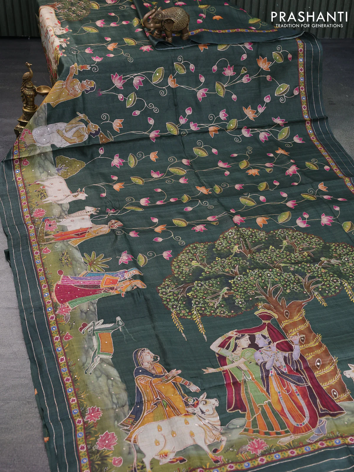 Pure tussar silk saree dark sap green with allover digital pichwai prints & pita work and zari line border - Image 13