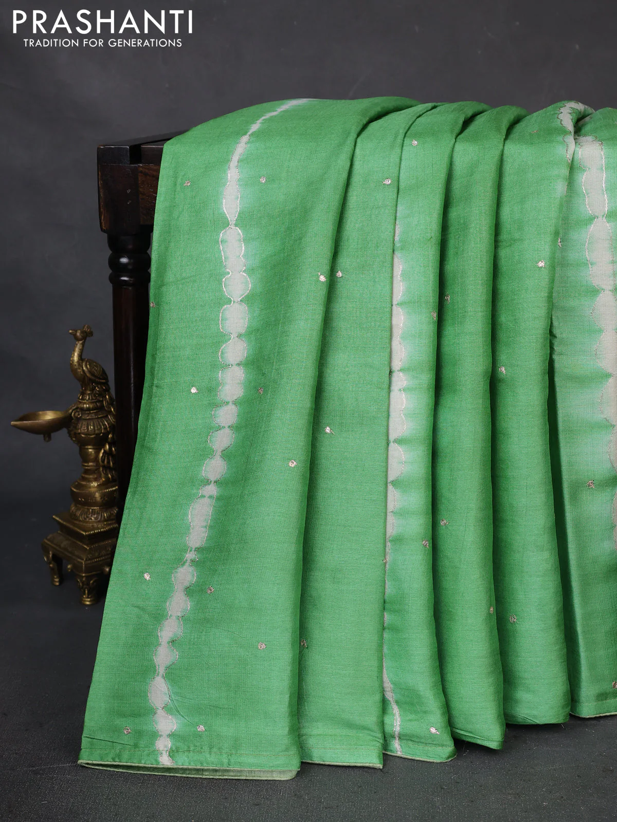 Pure tussar silk saree green and beige with tie & dye prints and pita work pallu
