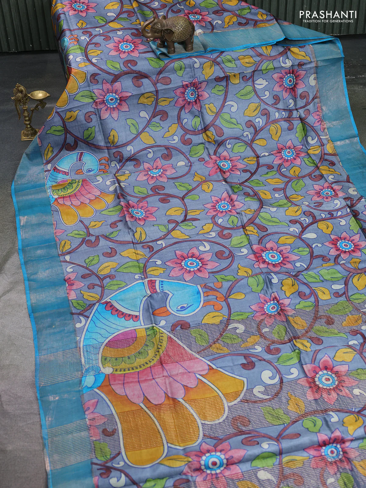 Pure tussar silk saree grey and cs blue with allover hand painted prints and zari woven border - Image 2