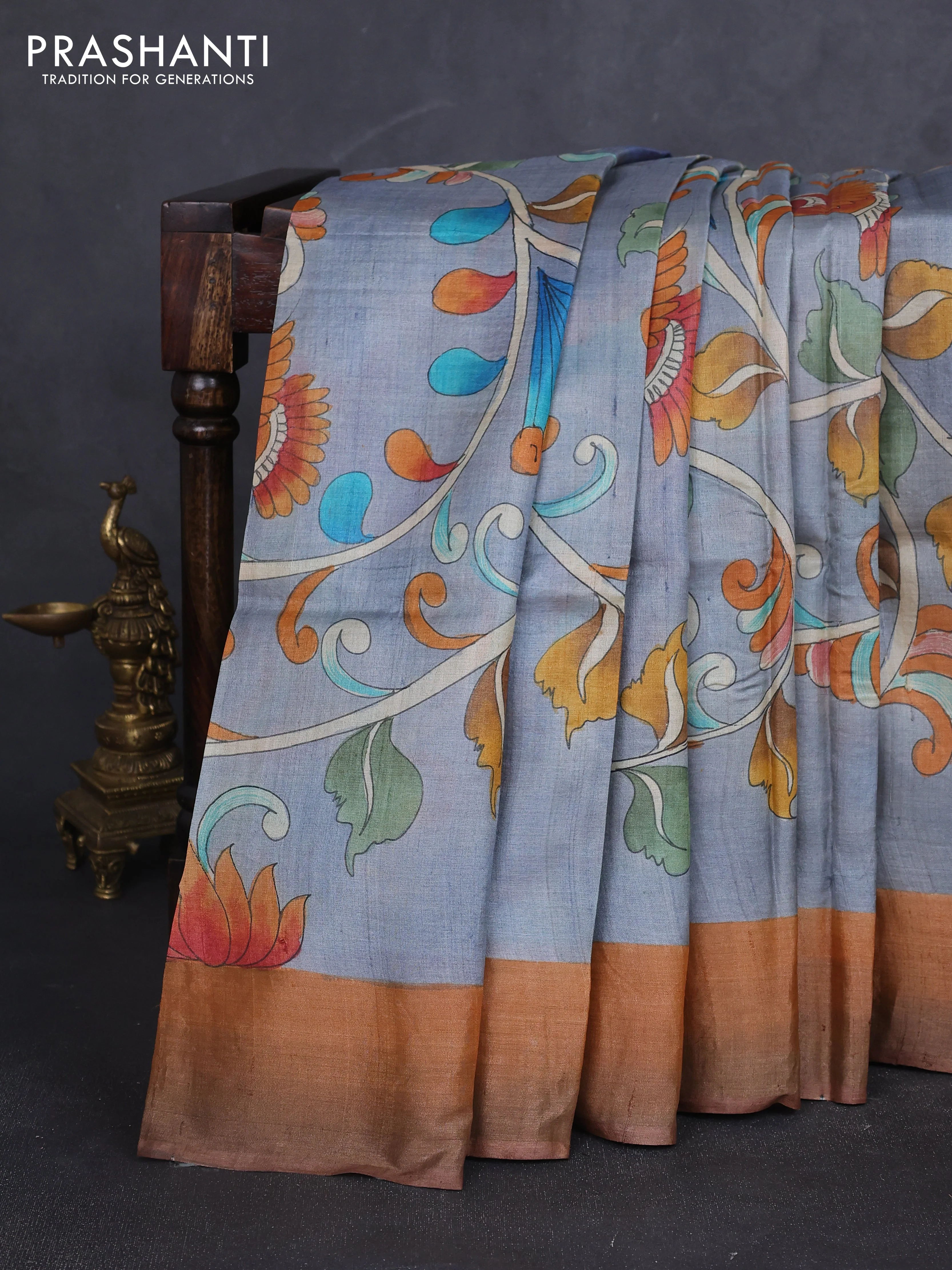 Pure tussar silk saree grey and peach shade with allover kalamkari hand painted prints and zari woven border