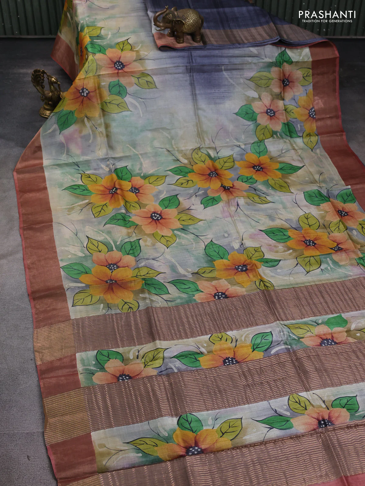 Pure tussar silk saree multi colour and peach shade with allover hand painted prints and zari woven border - Image 2