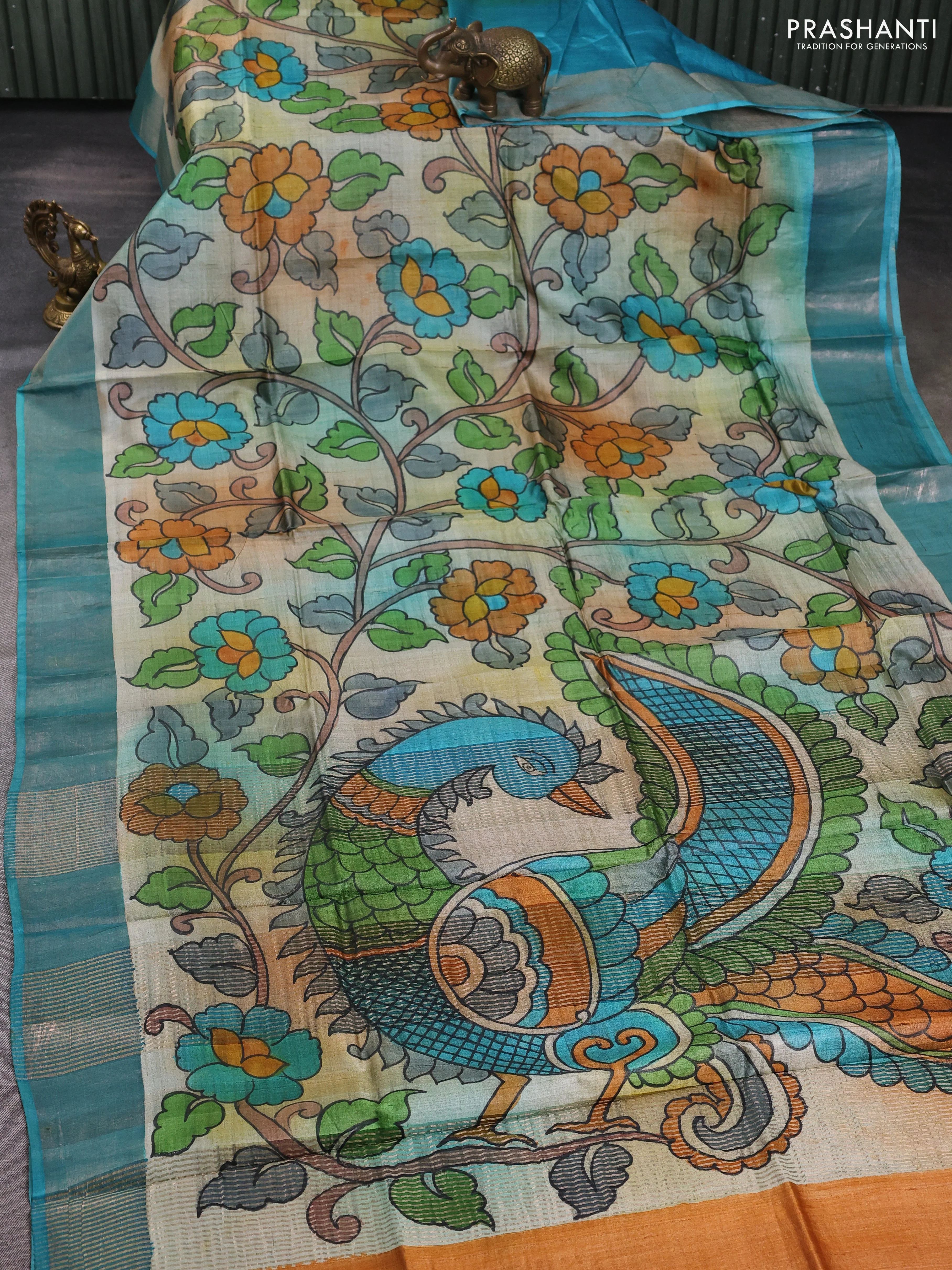 Pure tussar silk saree multi colour and teal blue with allover hand painted prints and zari woven border - Image 2