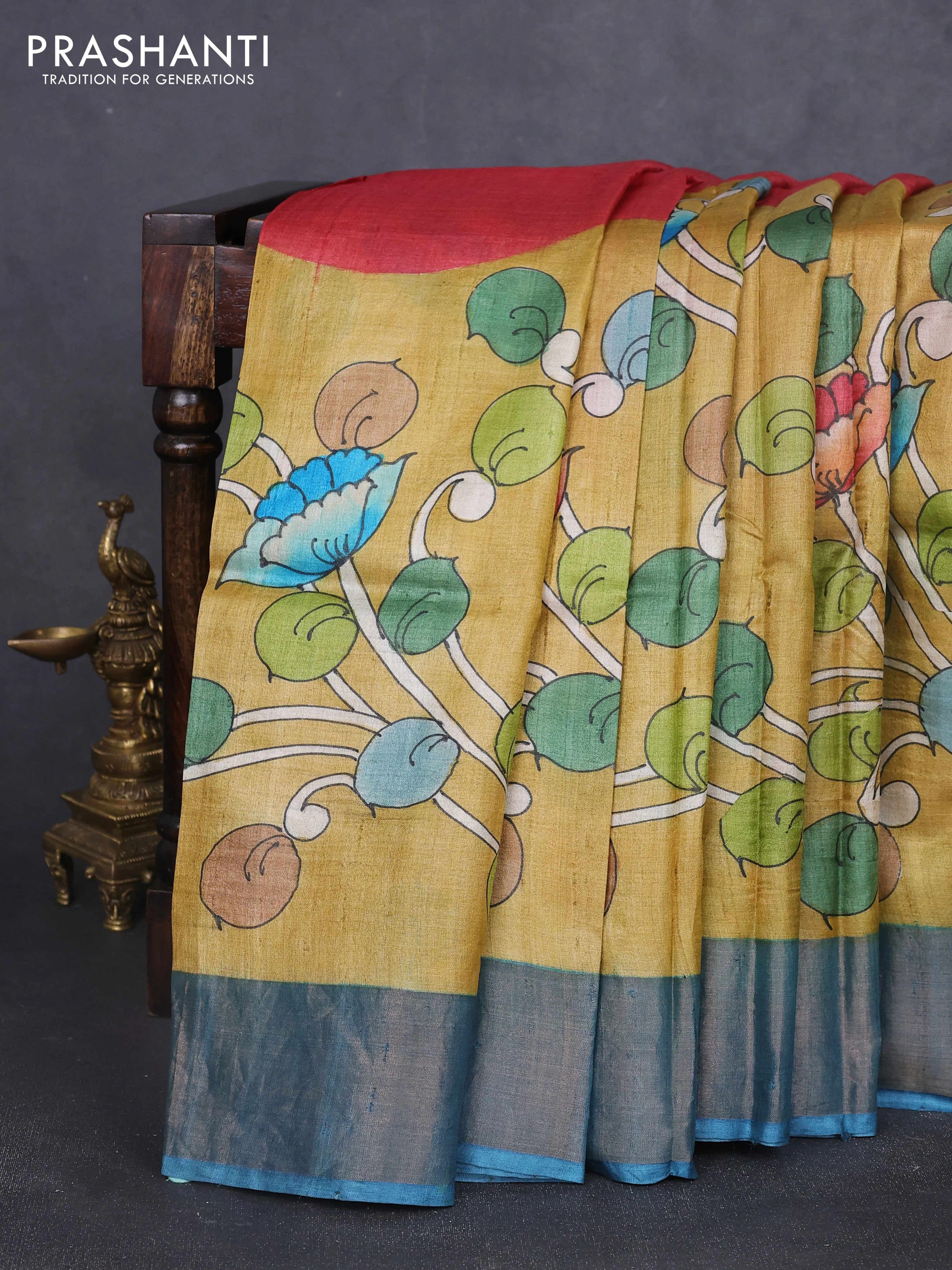 Pure tussar silk saree mustard yellow and blue with allover kalamkari hand painted prints and zari woven border