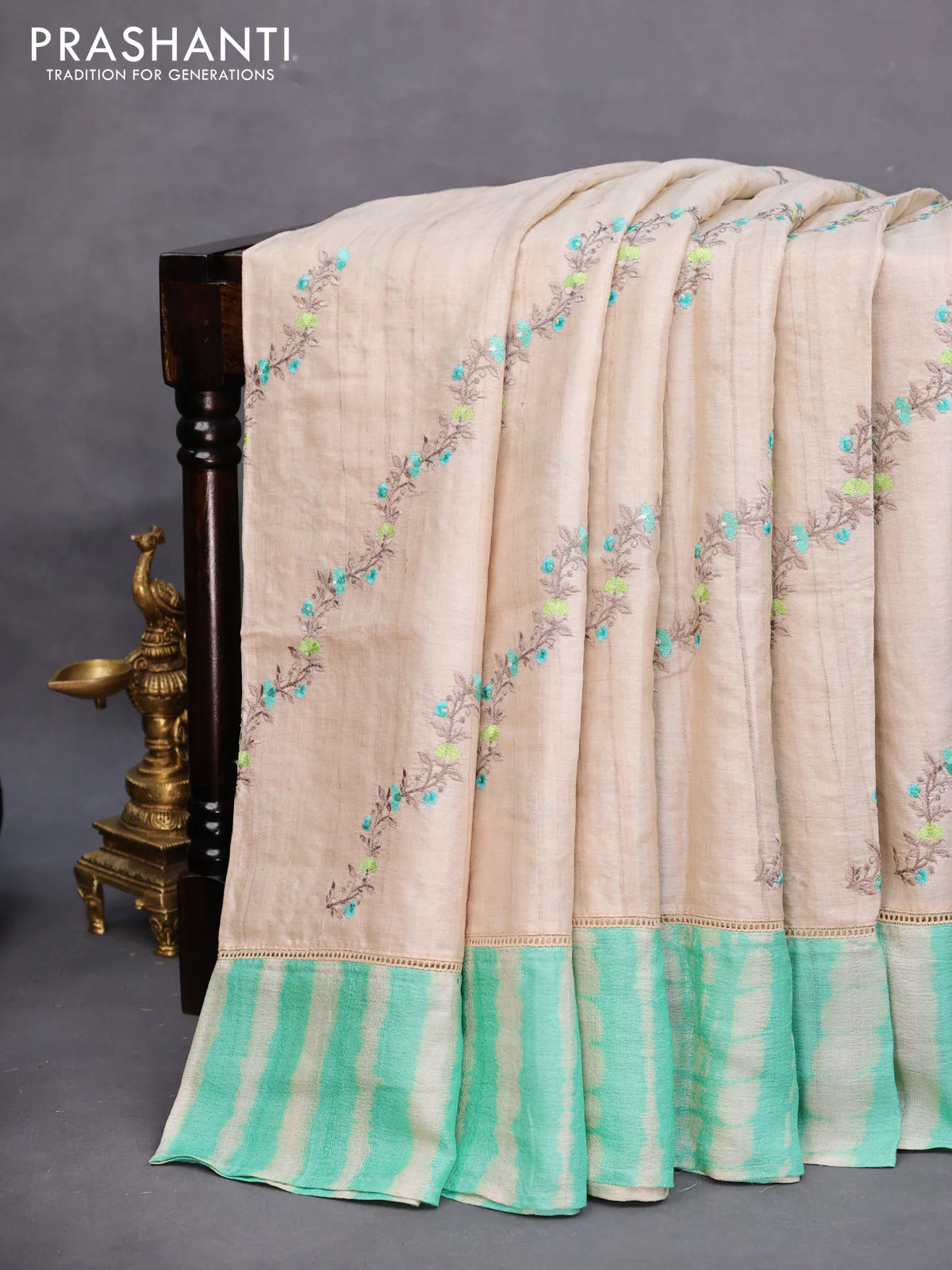 Pure tussar silk saree off white and teal green with allover embroidery work and tie & dye border - Image 2