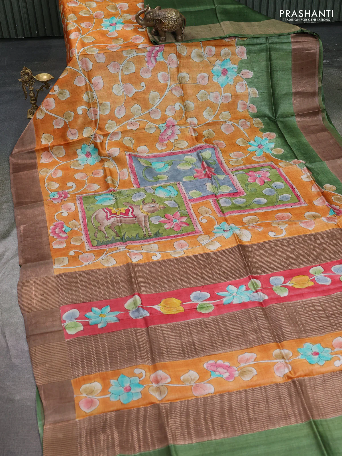 Pure tussar silk saree orange and brown with allover pichwai hand painted prints and zari woven border - Image 2