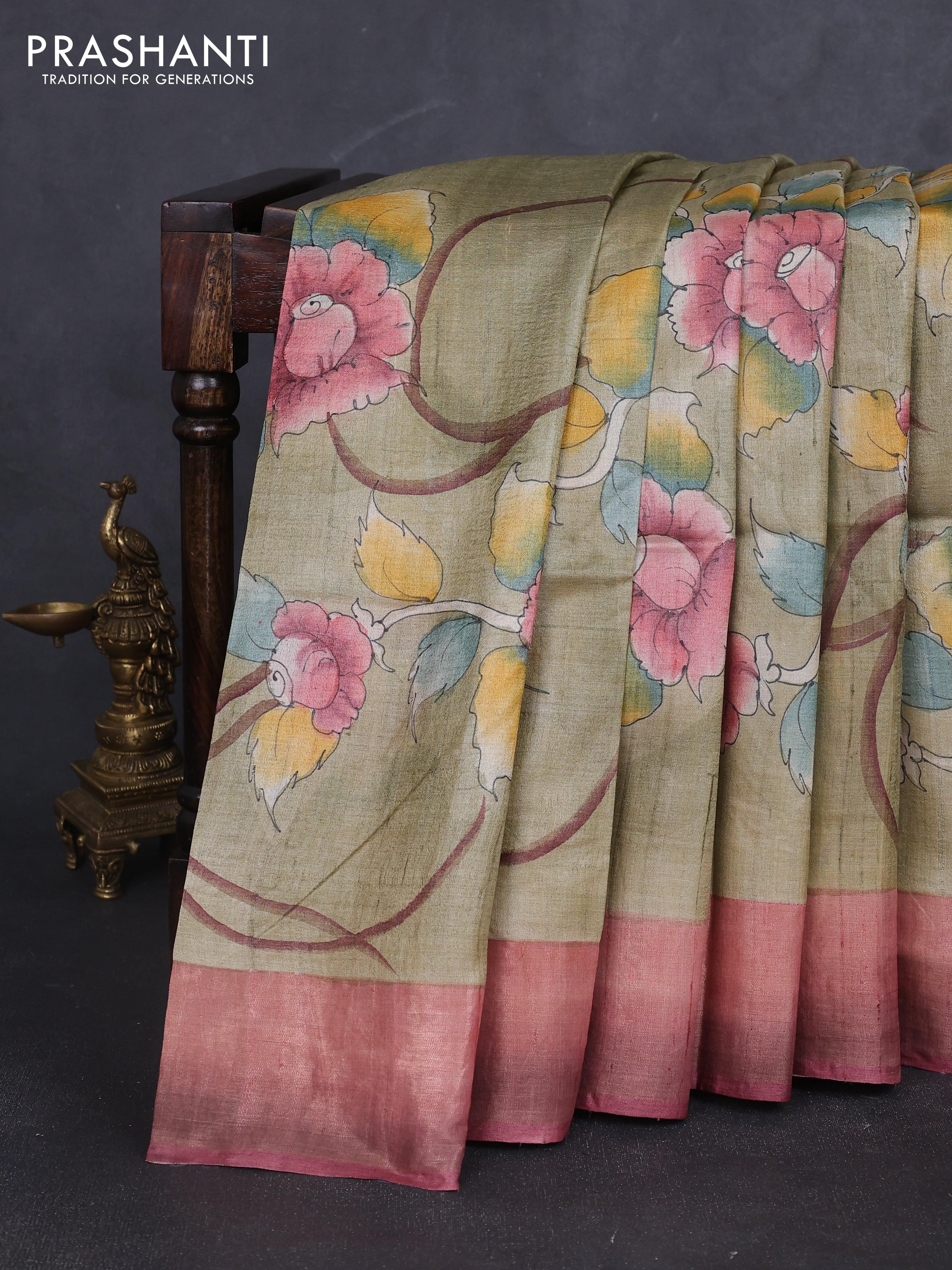 Pure tussar silk saree pastel green and peach piink with allover hand painted prints and zari woven border
