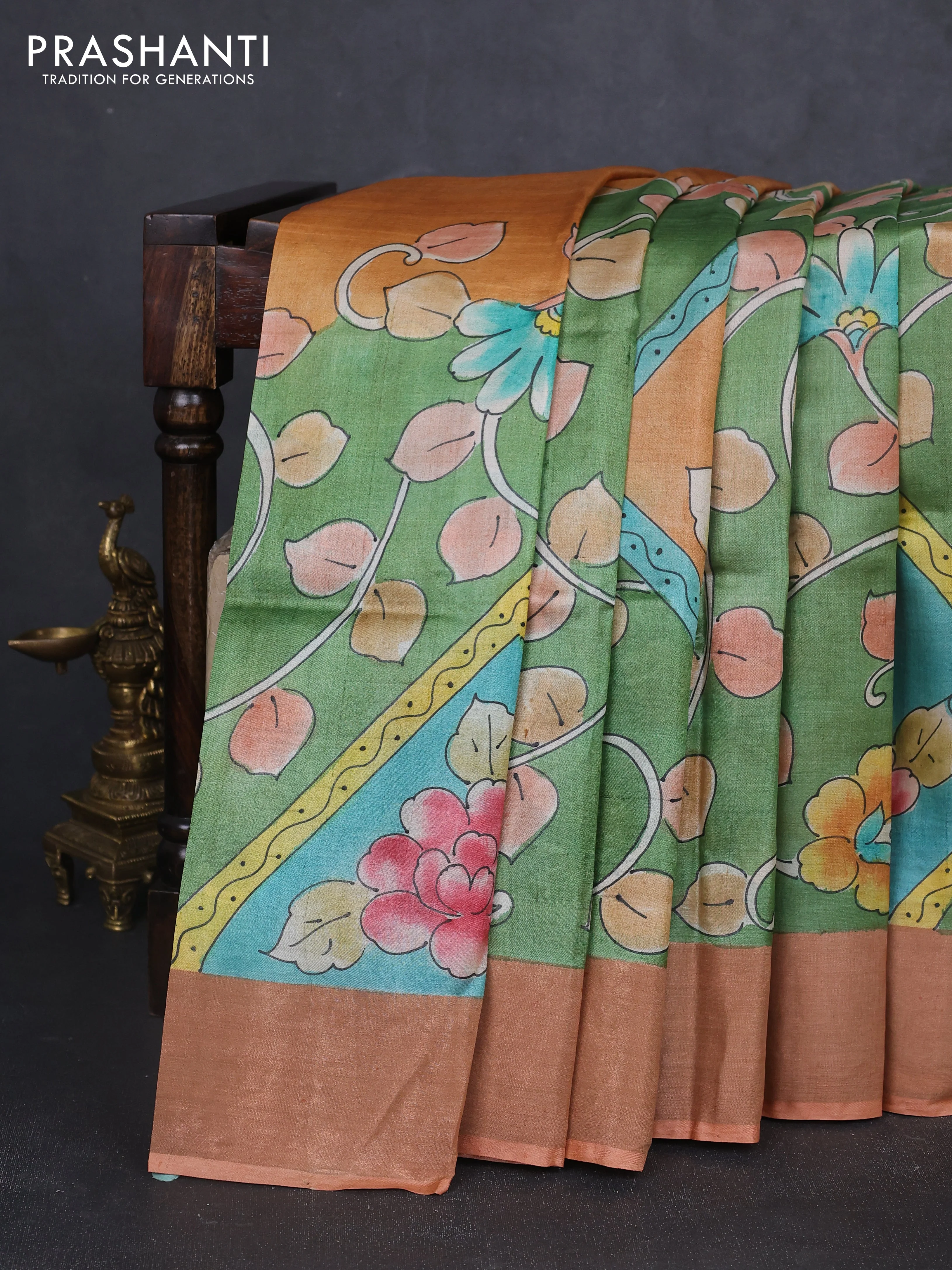 Pure tussar silk saree pastel green and peach shade with allover hand painted prints and zari woven border