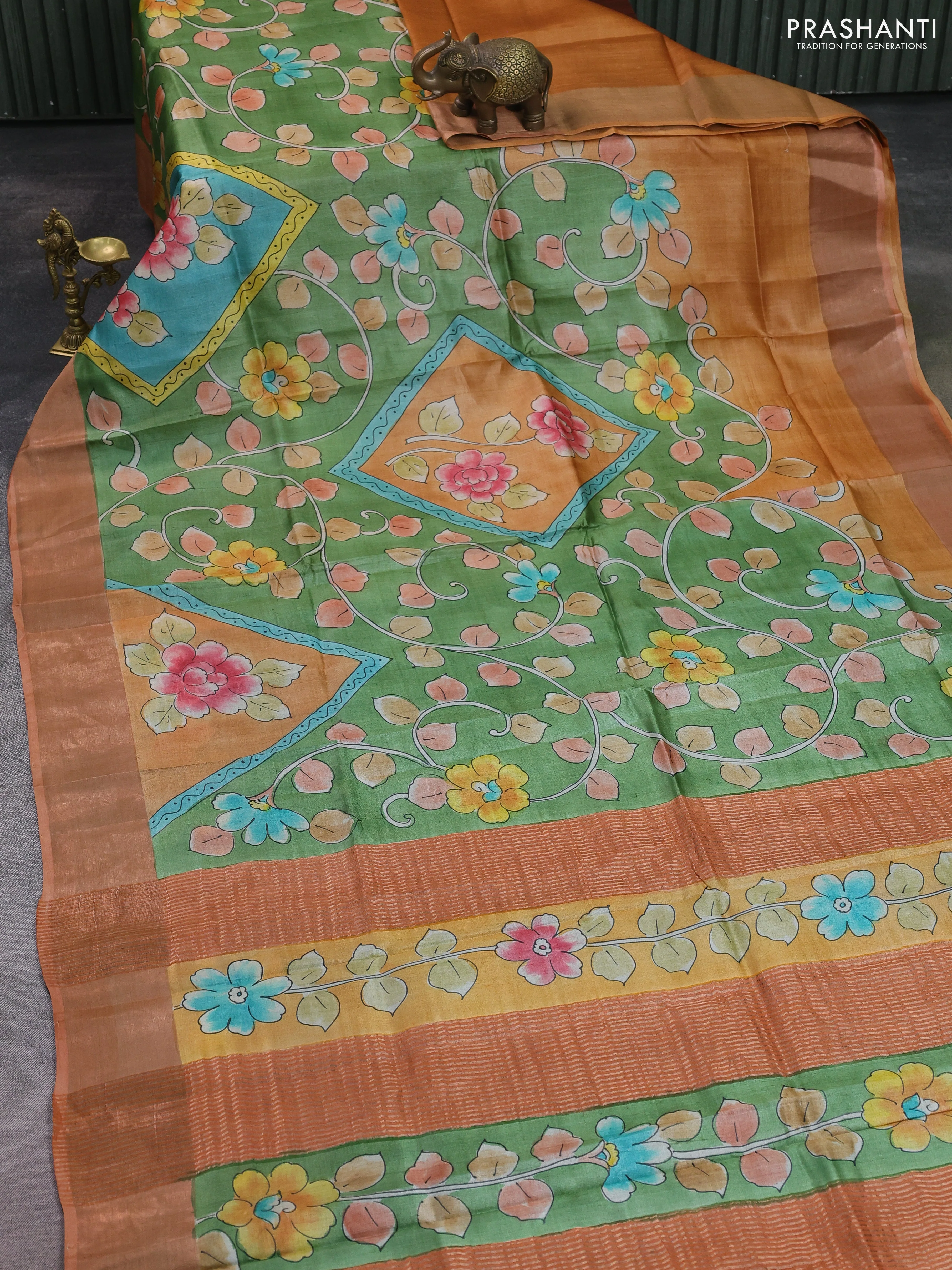 Pure tussar silk saree pastel green and peach shade with allover hand painted prints and zari woven border - Image 2