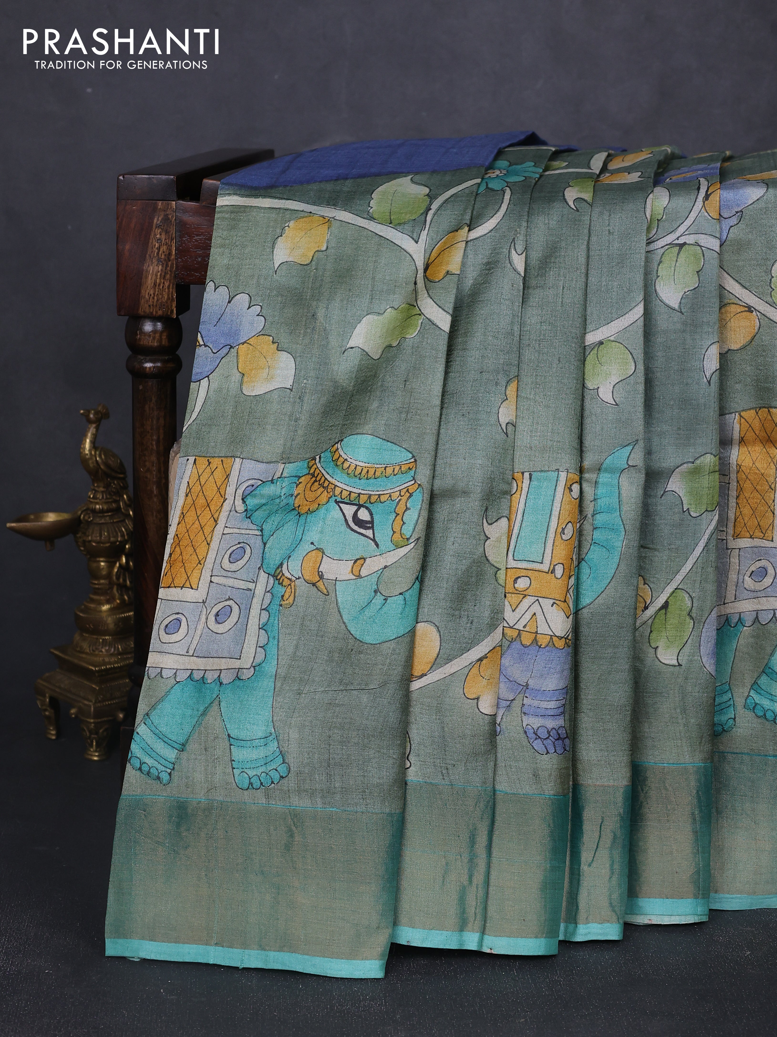 Pure tussar silk saree pastel green and teal green with allover kalamkari hand painted prints and zari woven border