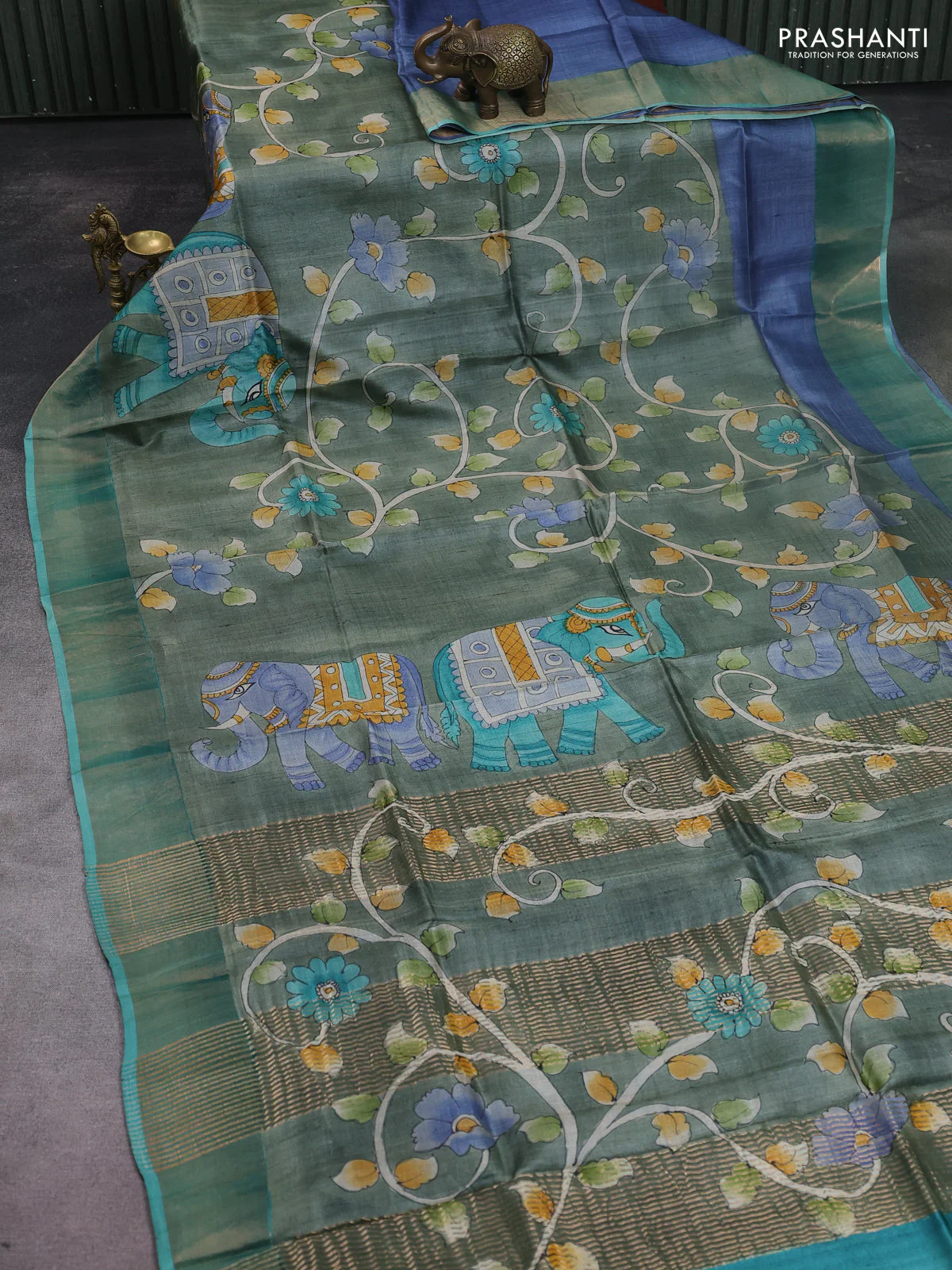 Pure tussar silk saree pastel green and teal green with allover kalamkari hand painted prints and zari woven border - Image 2