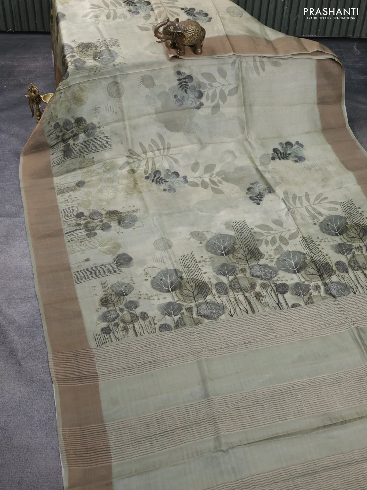 Pure tussar silk saree pastel green with digital prints and zari woven border