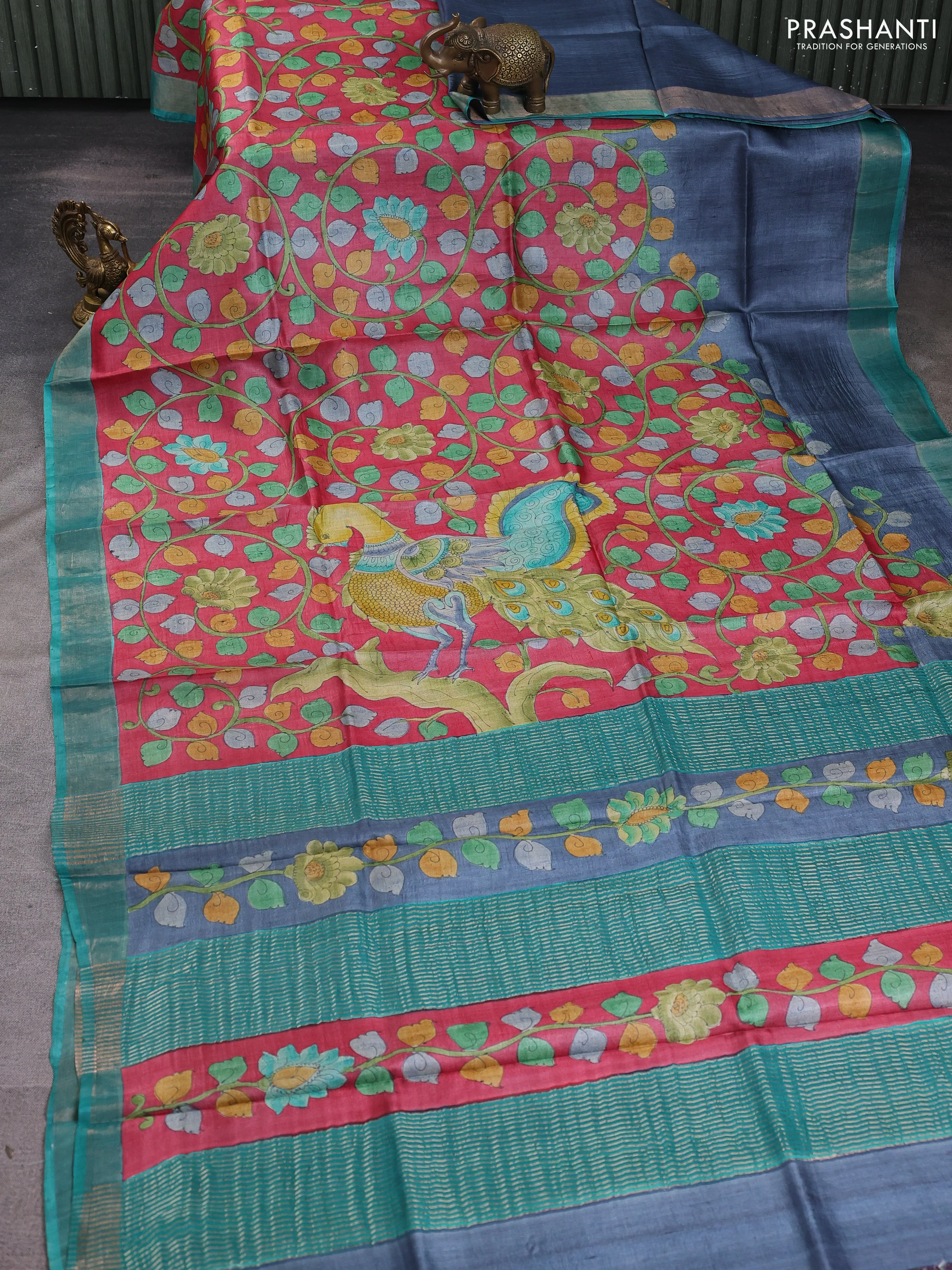 Pure tussar silk saree peach pink and teal green with allover kalamkari hand painted prints and zari woven border - Image 2