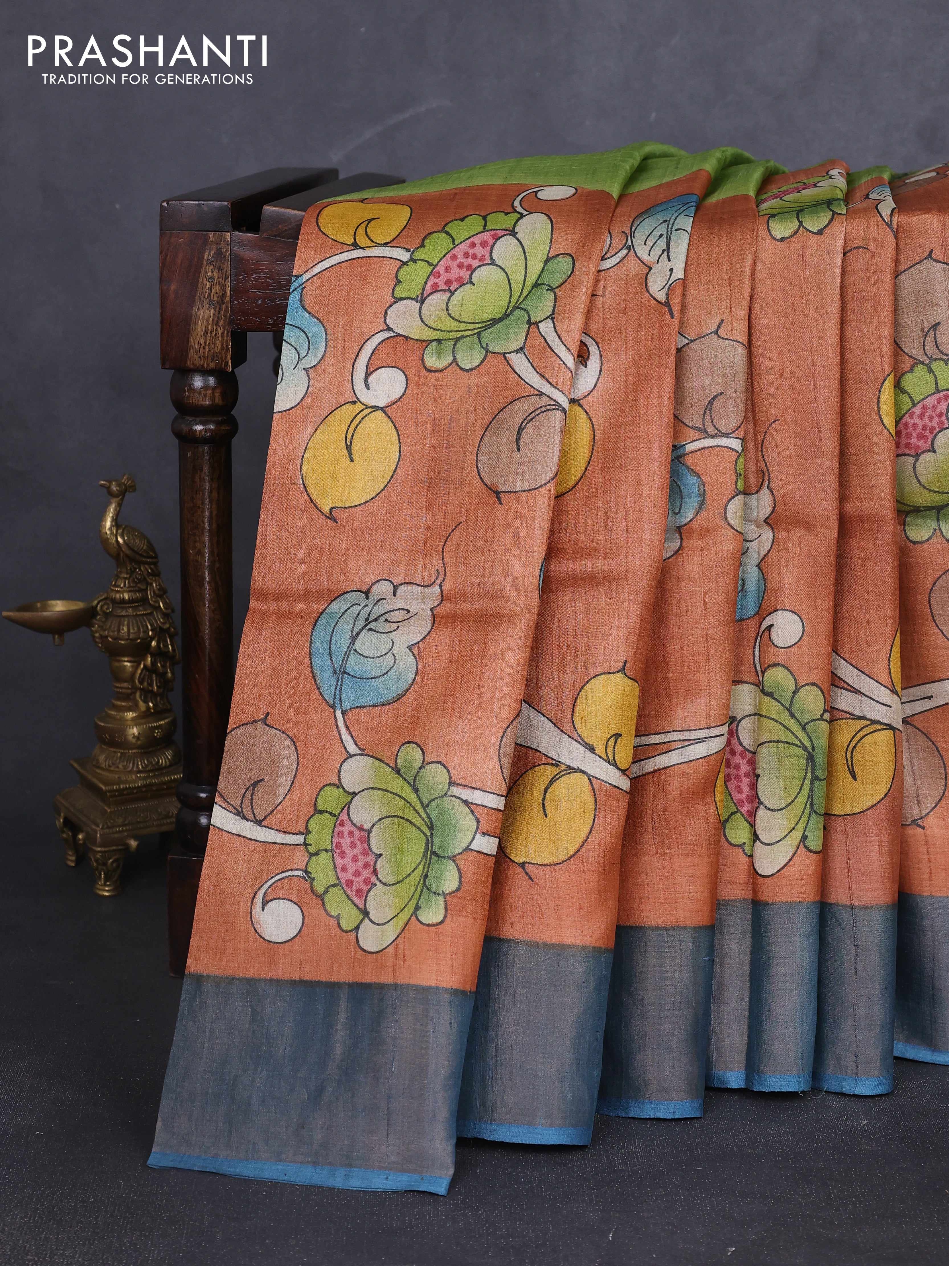 Pure tussar silk saree peach shade and bluish grey with allover kalamkari hand painted prints and zari woven border