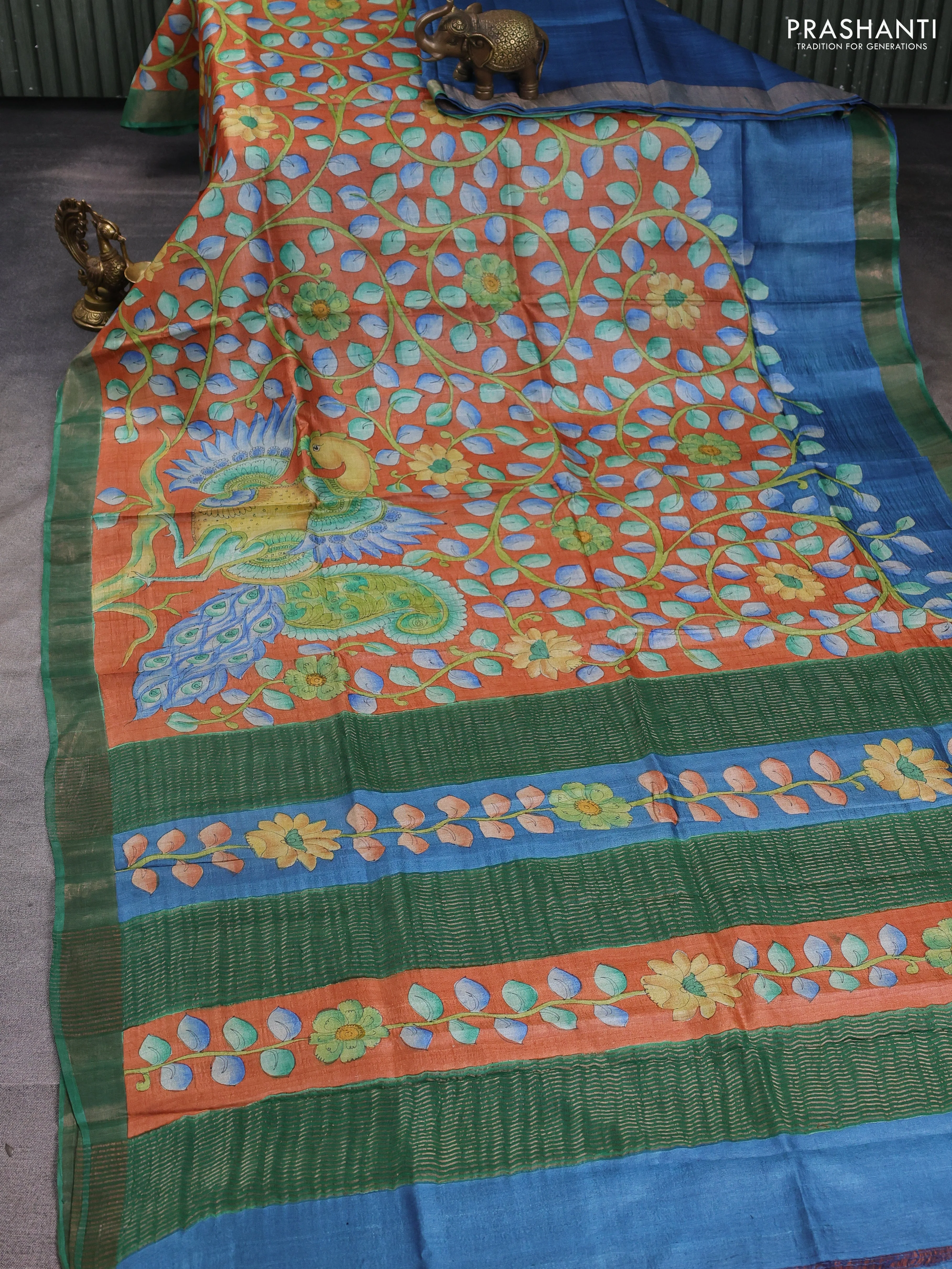 Pure tussar silk saree peach shade and green with allover kalamkari hand painted prints and zari woven border - Image 2
