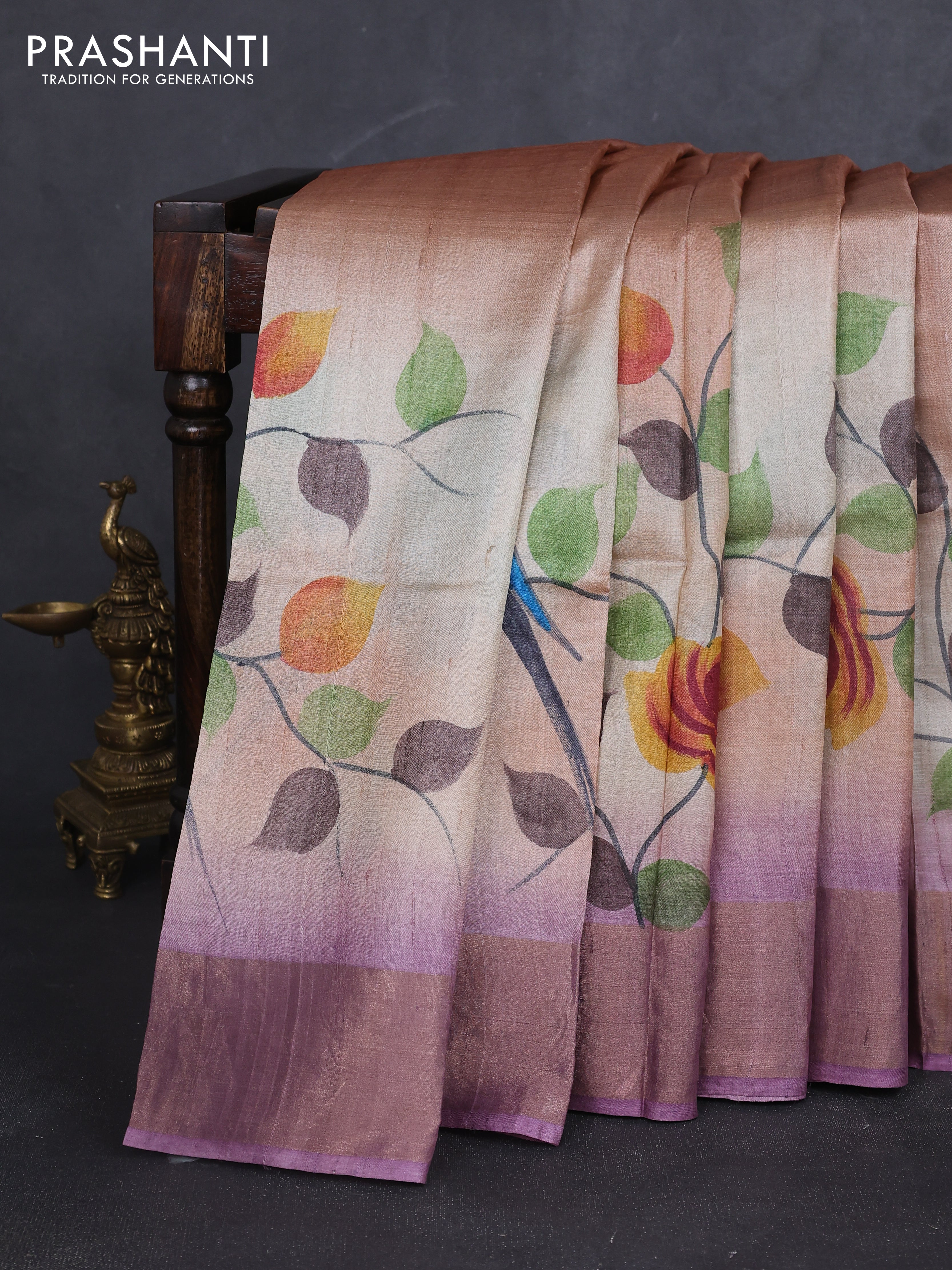 Pure tussar silk saree peach shade and purple with allover hand painted prints and zari woven border
