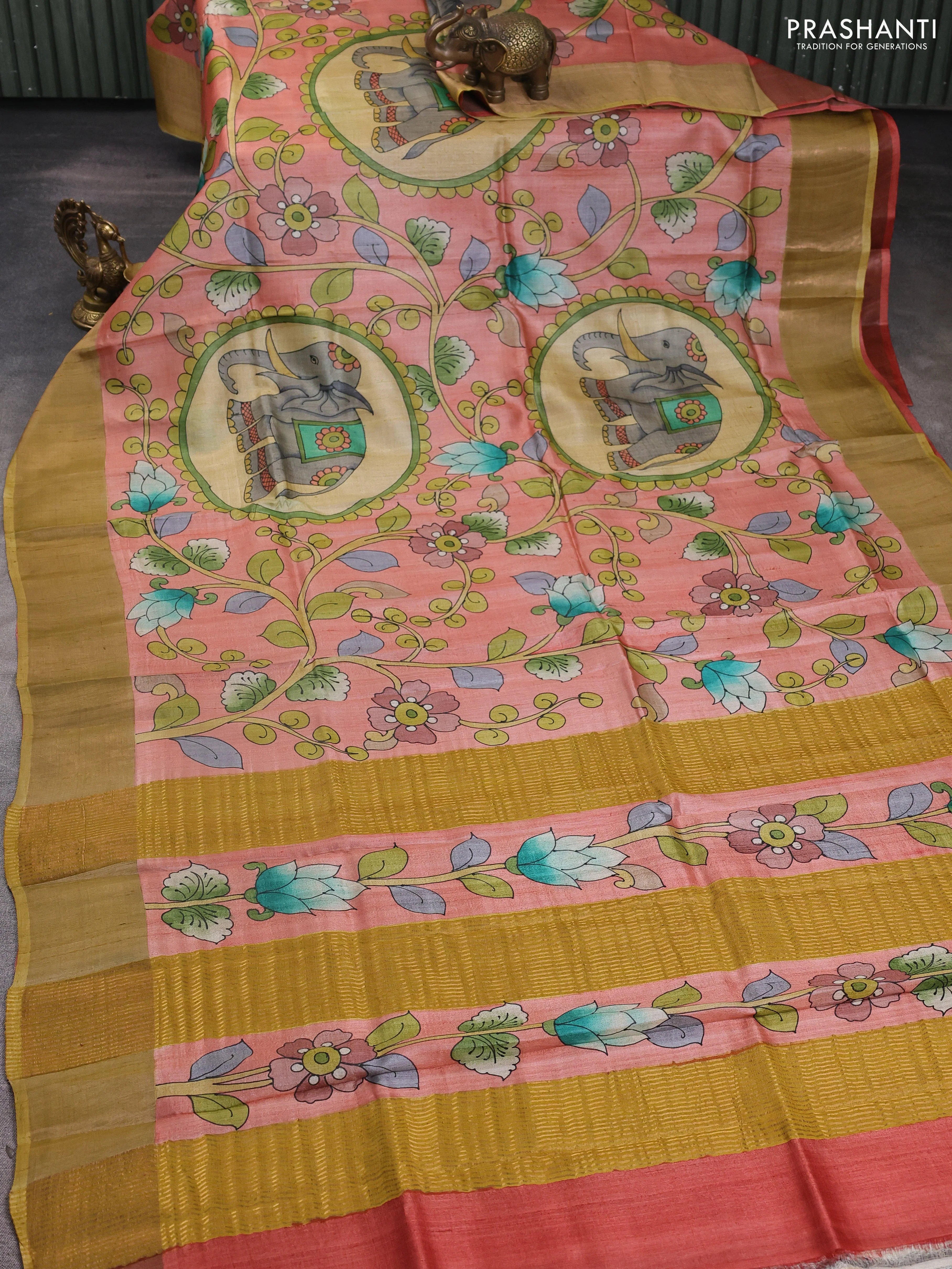 Pure tussar silk saree peach shade and sandal with allover kalamkari hand painted prints and zari woven border - Image 2