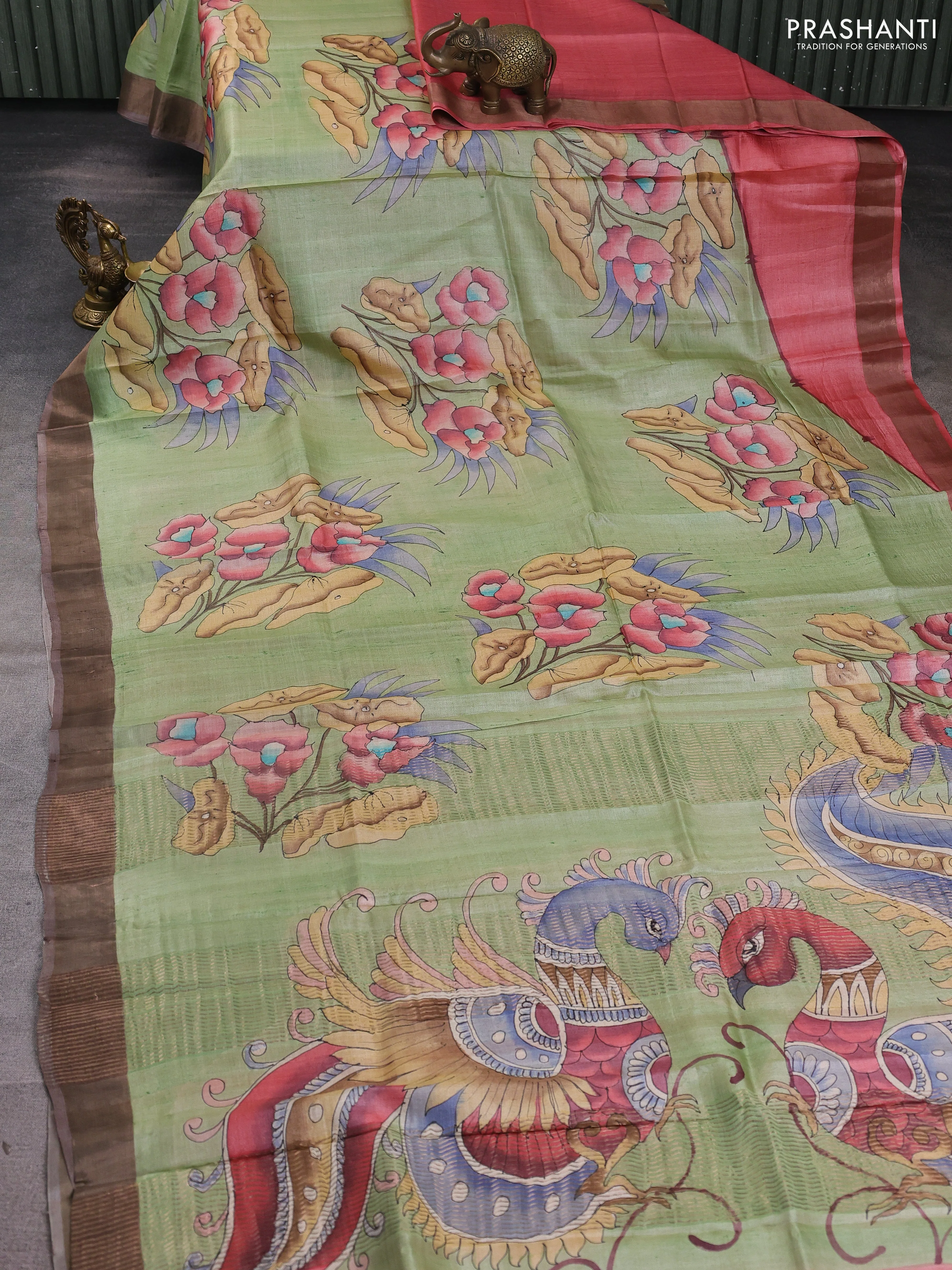 Pure tussar silk saree pista green and brown with allover hand painted prints and zari woven border - Image 2