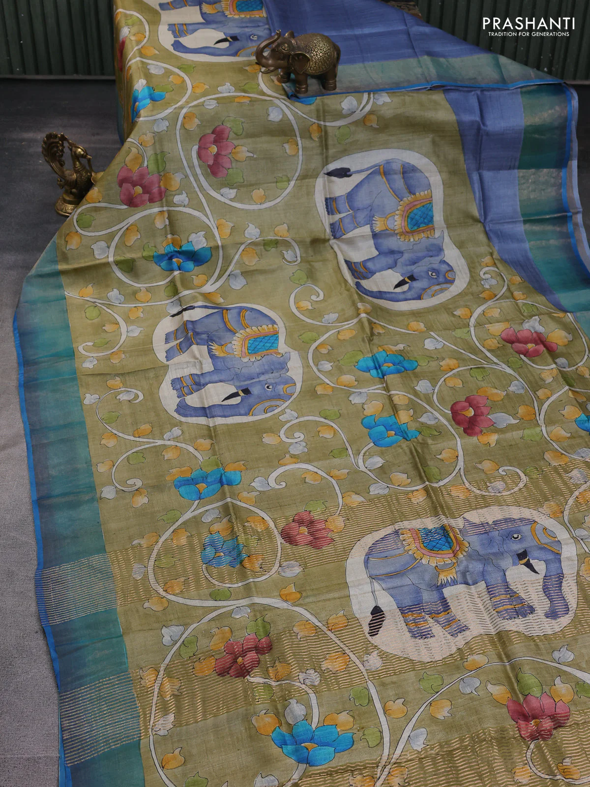 Pure tussar silk saree sandal and blue with allover hand painted prints and zari woven border - Image 2