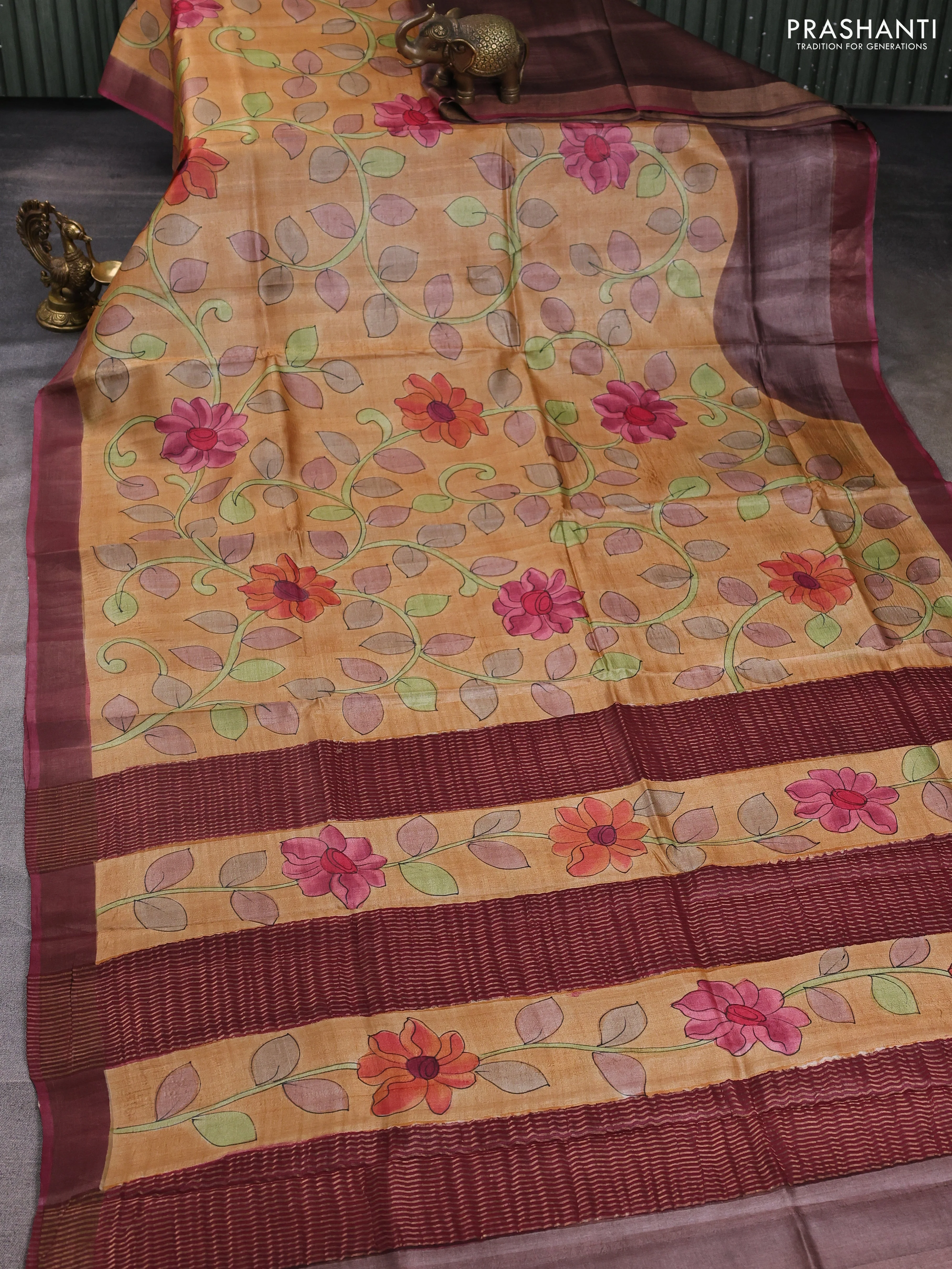 Pure tussar silk saree sandal and mauve pink with allover hand painted prints and zari woven border - Image 2