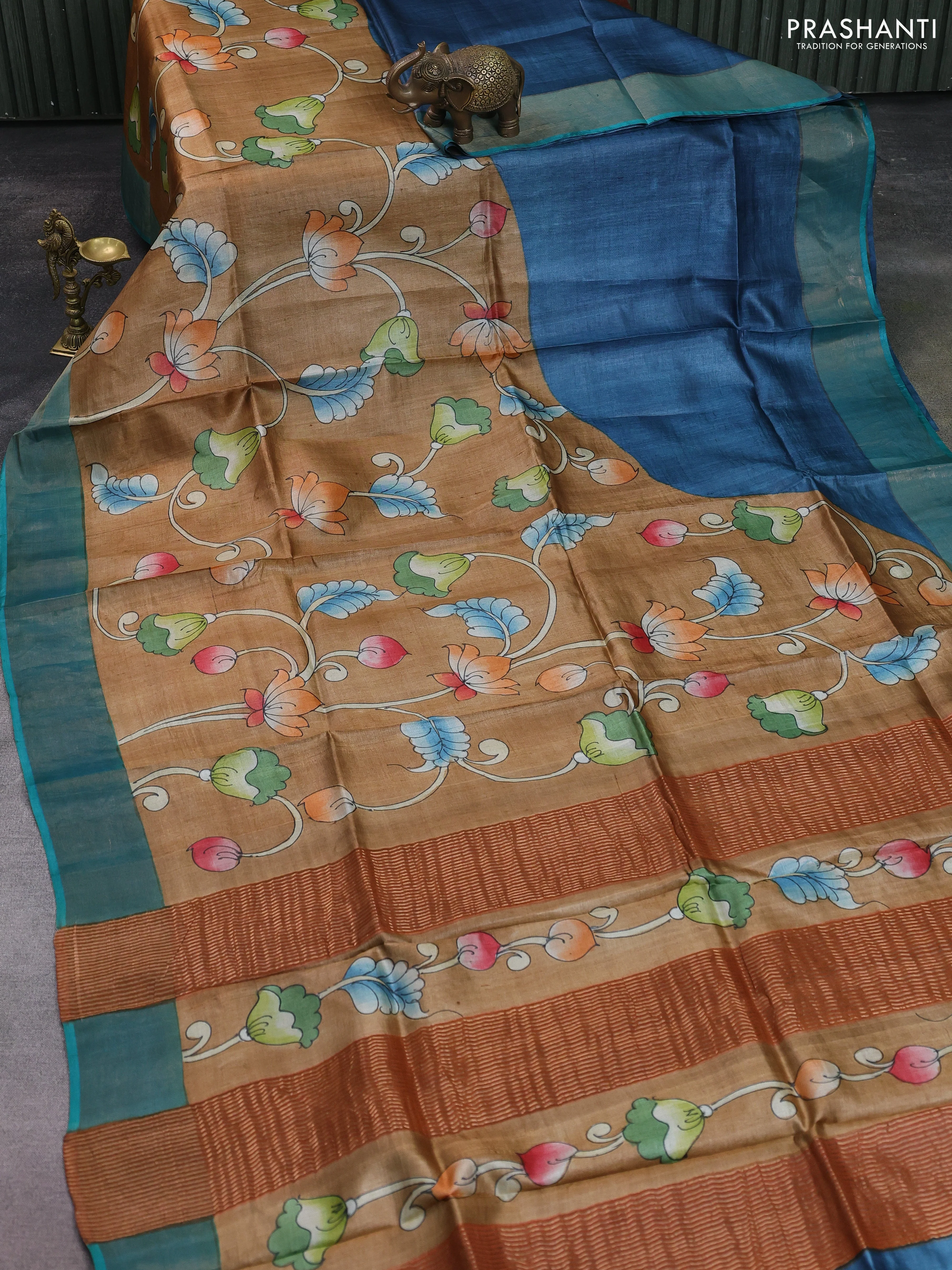 Pure tussar silk saree sandal and teal blue with allover kalamkari hand painted prints and zari woven border - Image 2