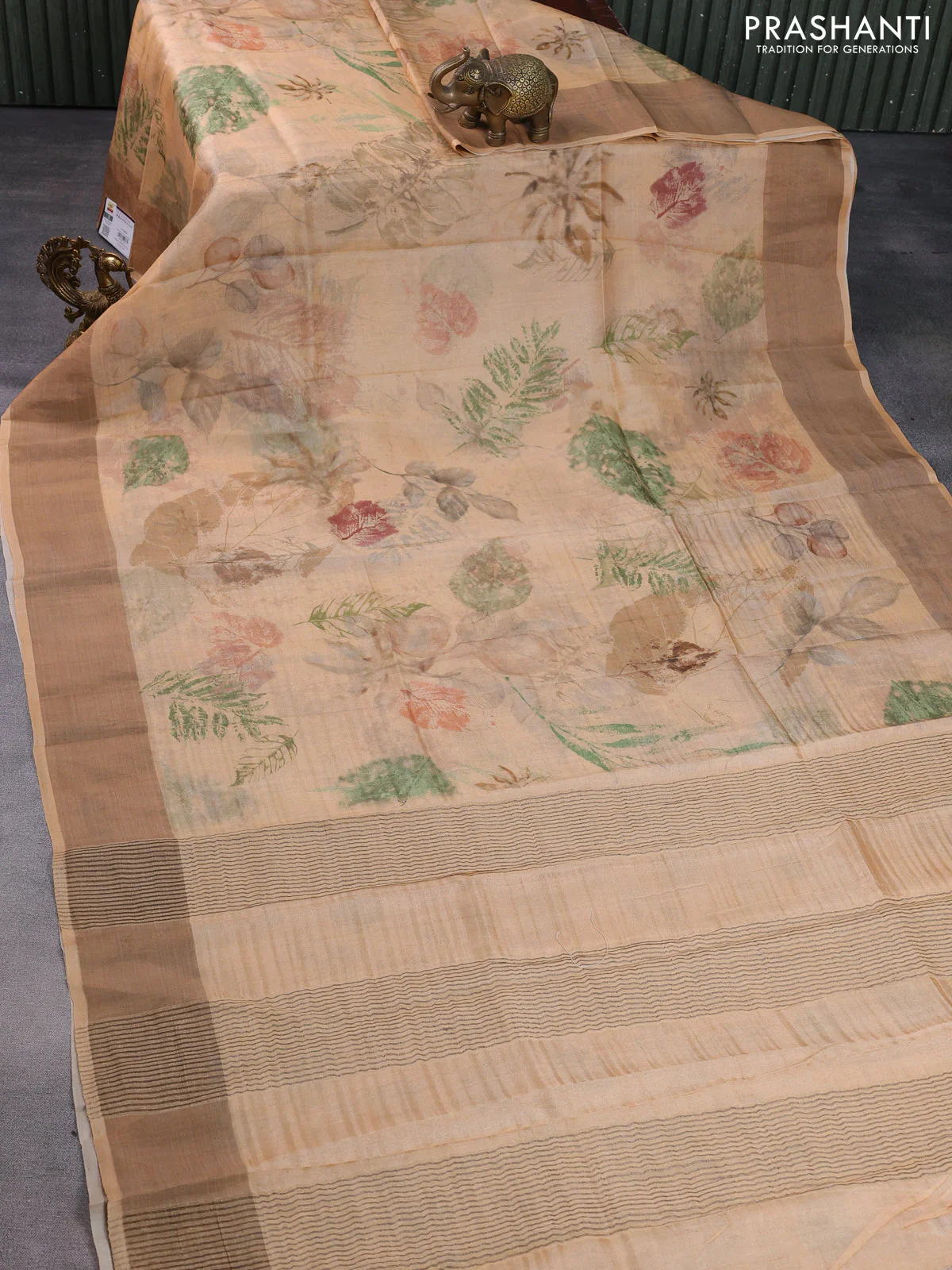 Pure tussar silk saree sandal with allover digital prints and zari woven border