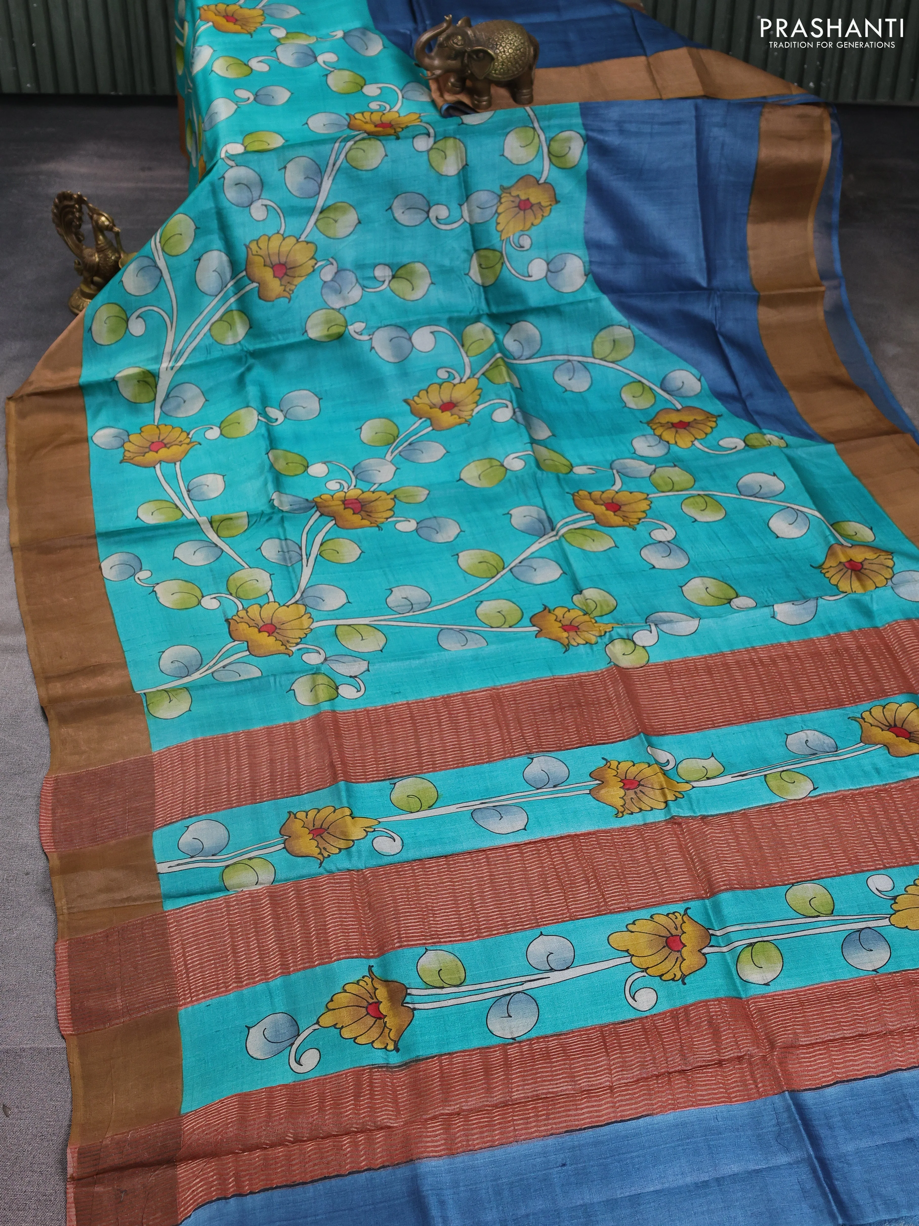 Pure tussar silk saree teal green and sandal with allover kalamkari hand painted prints and zari woven border - Image 2