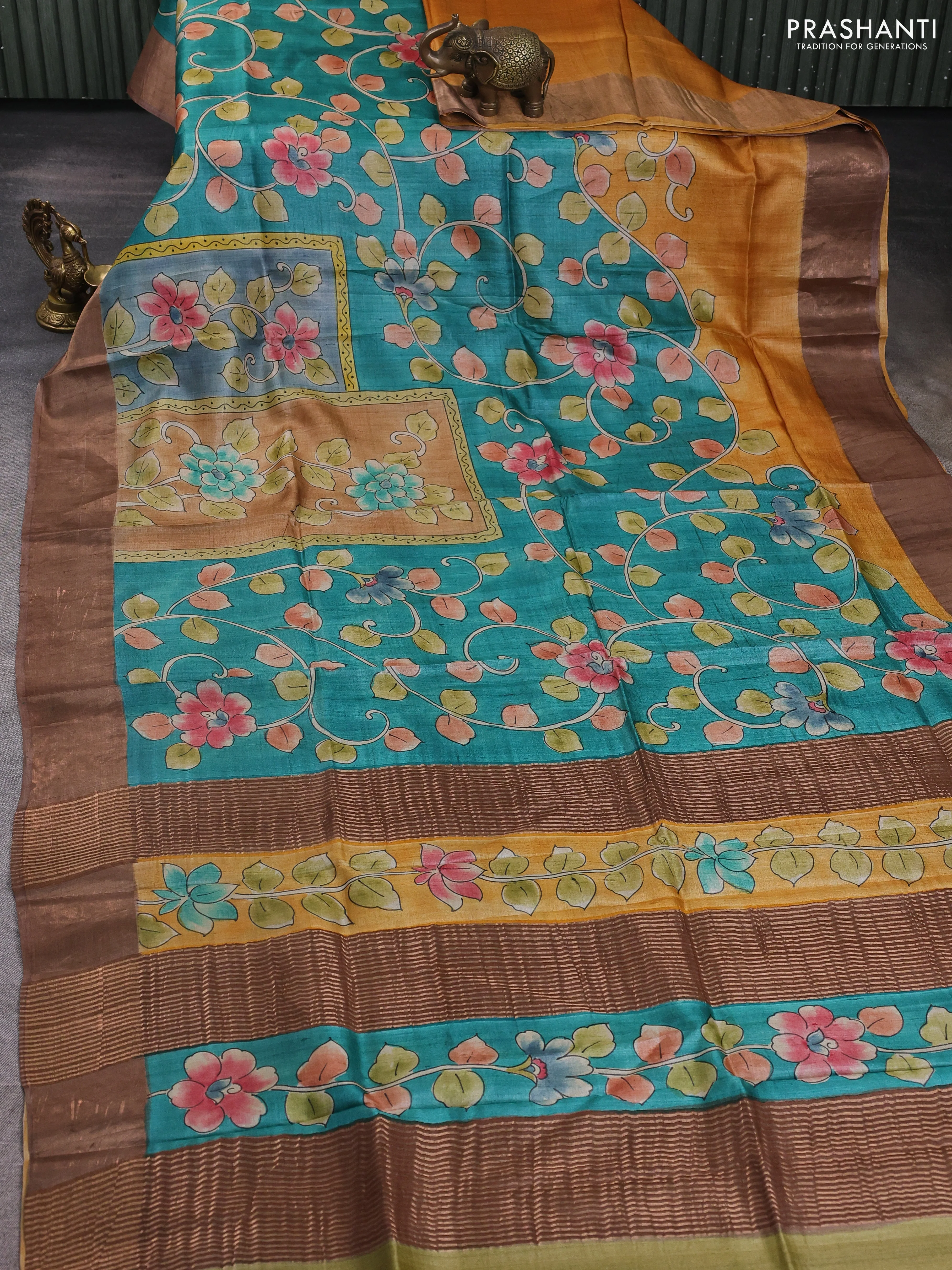 Pure tussar silk saree teal green and sandal with allover kalamkari hand painted prints and zari woven border - Image 2