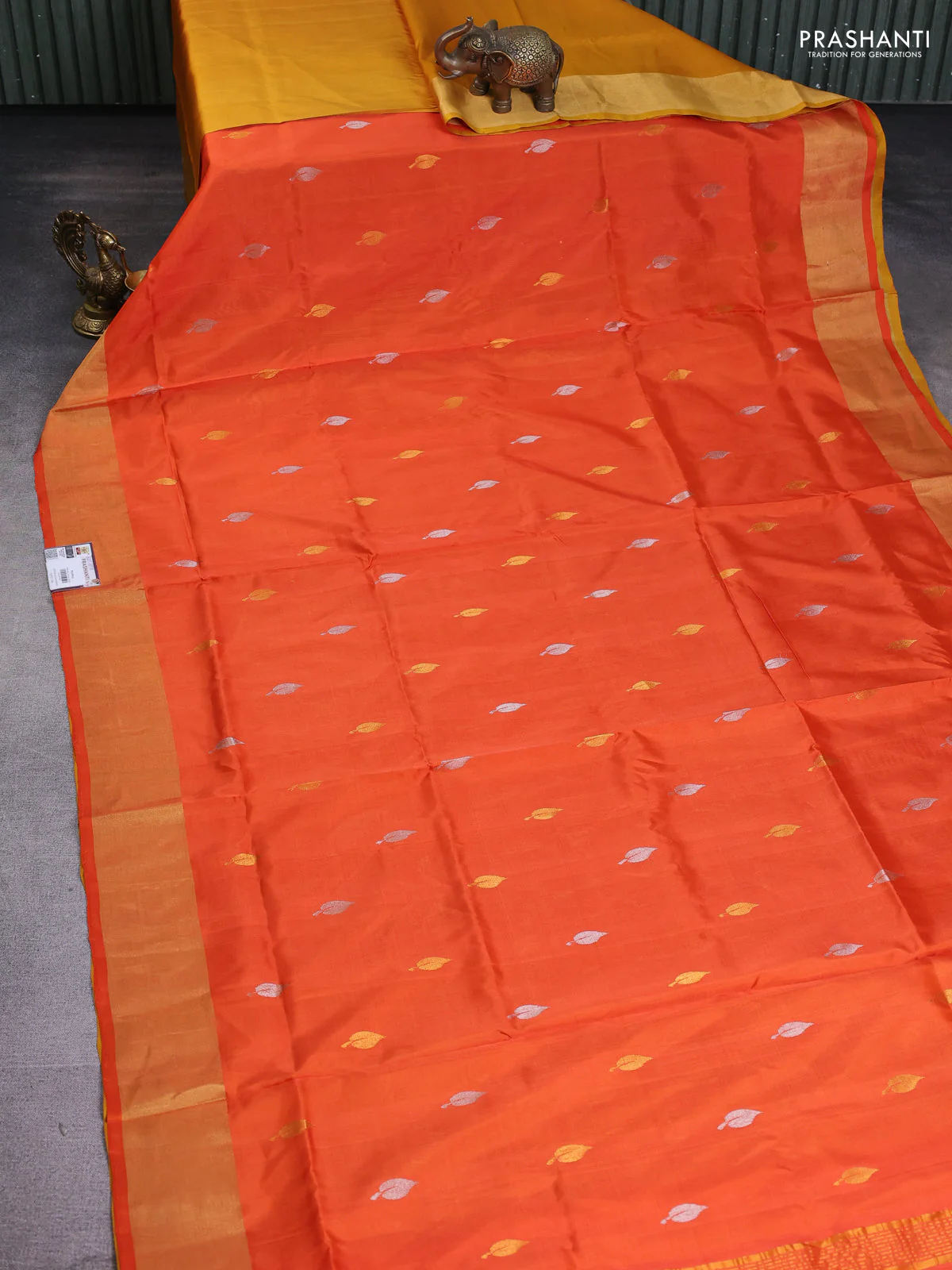 Pure uppada partly silk saree orange and mustard yellow with silver & gold zari woven leaf buttas and zari woven border - Image 2