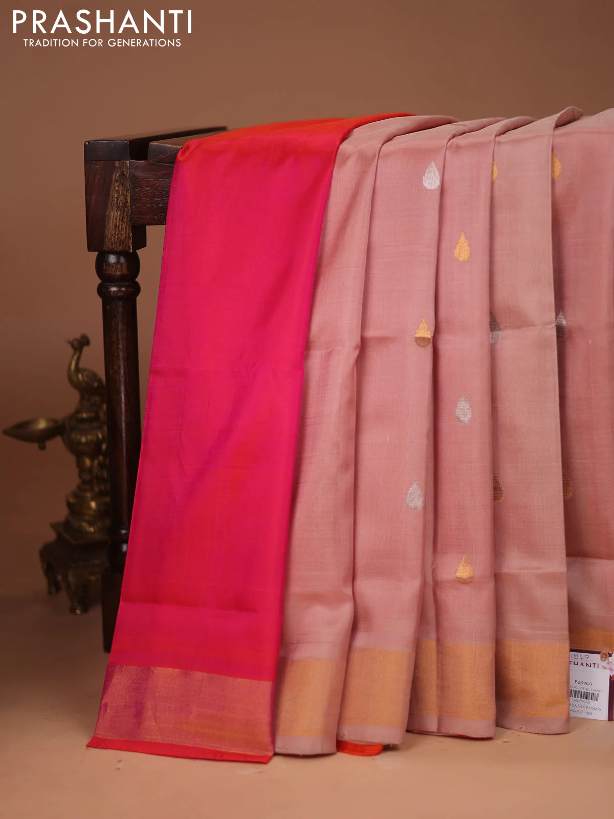 Pure uppada partly silk saree peach shade and dual shade of pinkish orange with silver & gold zari woven tilak buttas and zari woven border