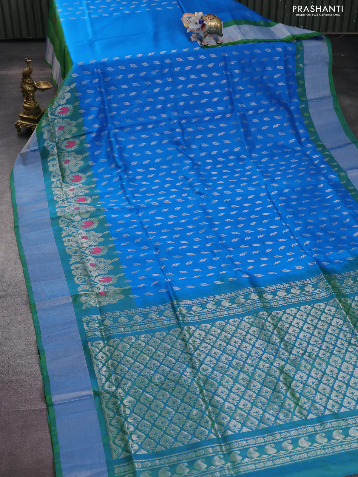 Pure uppada silk saree cs blue and dual shade of green with allover silver zari woven leaf buttas and silver zari woven border - Image 2