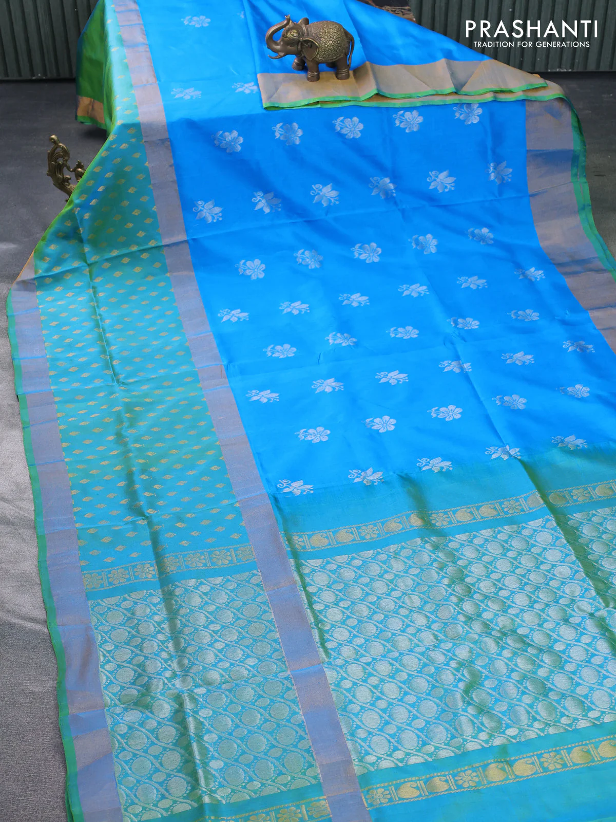 Pure uppada silk saree cs blue and dual shade of teal green with silver zari woven floral buttas and zari woven butta border - Image 2