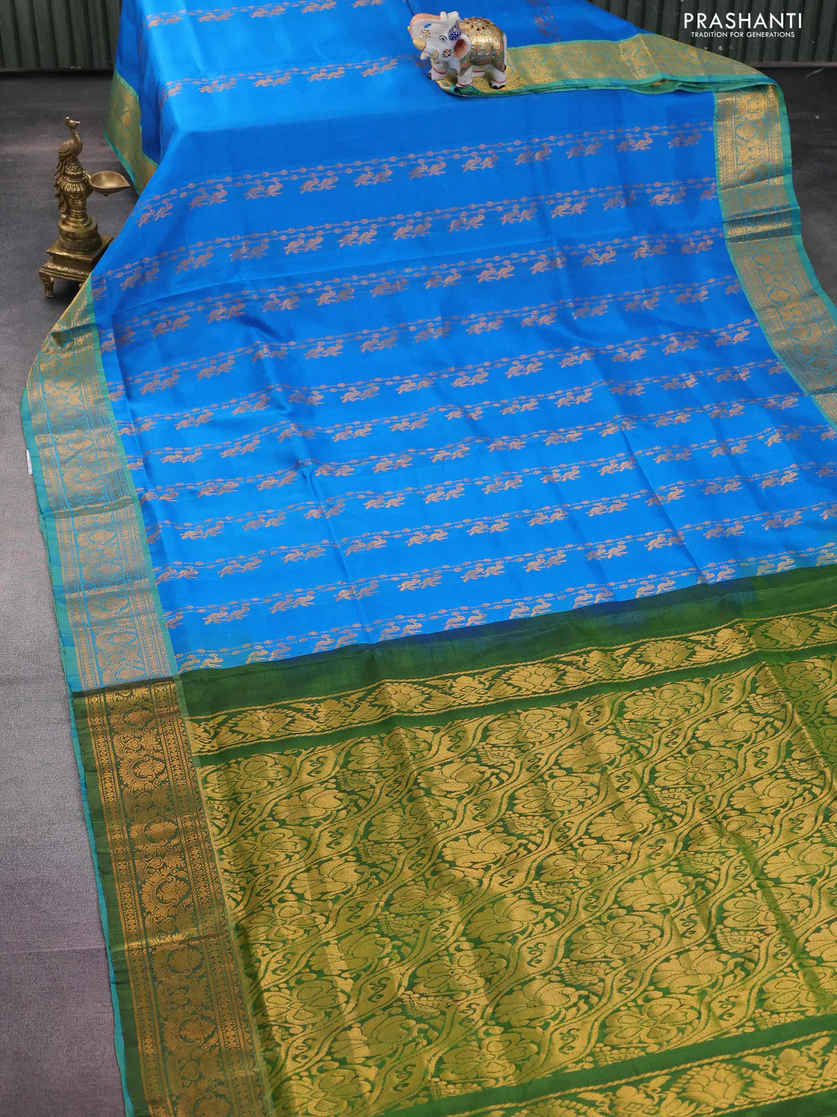 Pure uppada silk saree cs blue and green with allover zari weaves and zari woven border - Image 2