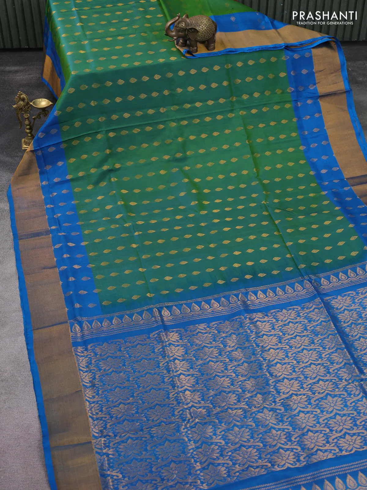 Pure uppada silk saree dual shade of green and cs blue with allover zari woven buttas and zari woven border - Image 2