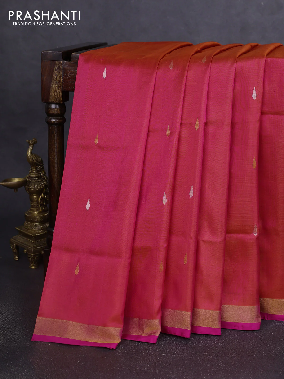 Pure uppada silk saree dual shade of pinkish orange and pink with thread & zari woven thilak buttas and jamdhani design pallu
