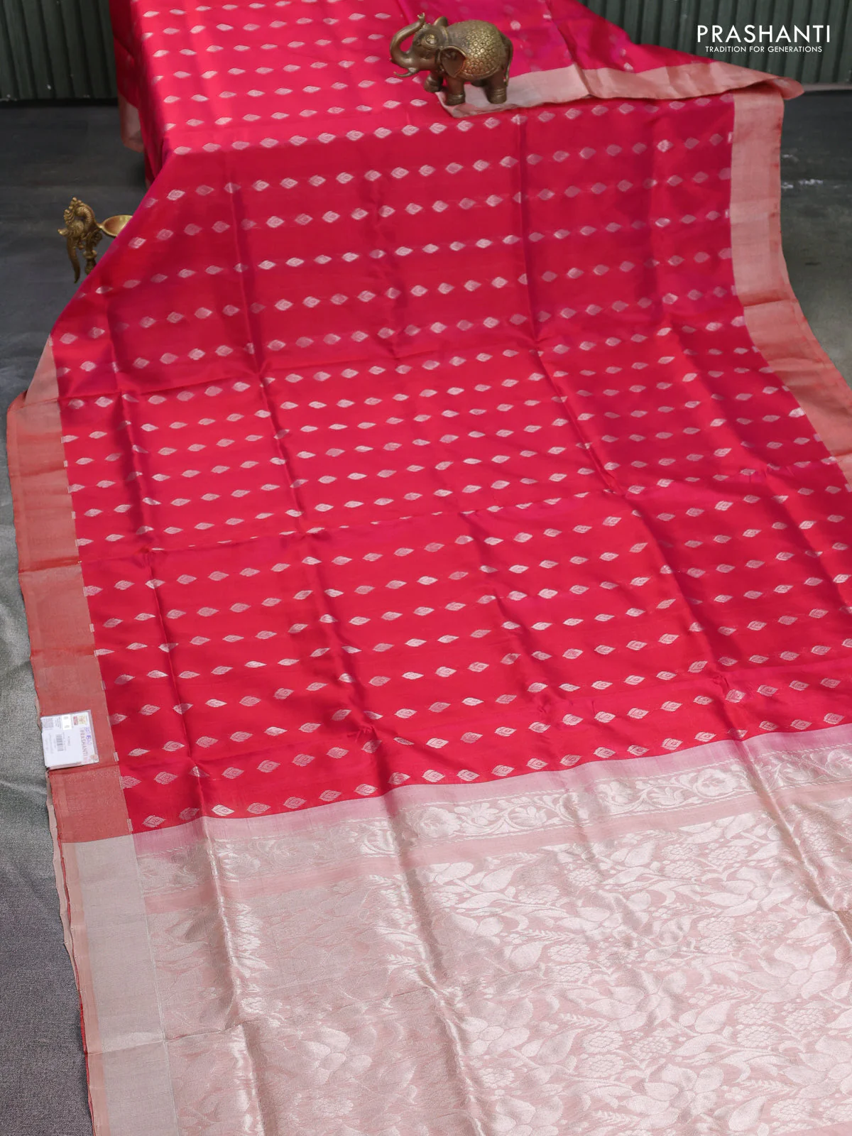 Pure uppada silk saree dual shade of pinkish orange with silver zari woven buttas and zari woven border - Image 2
