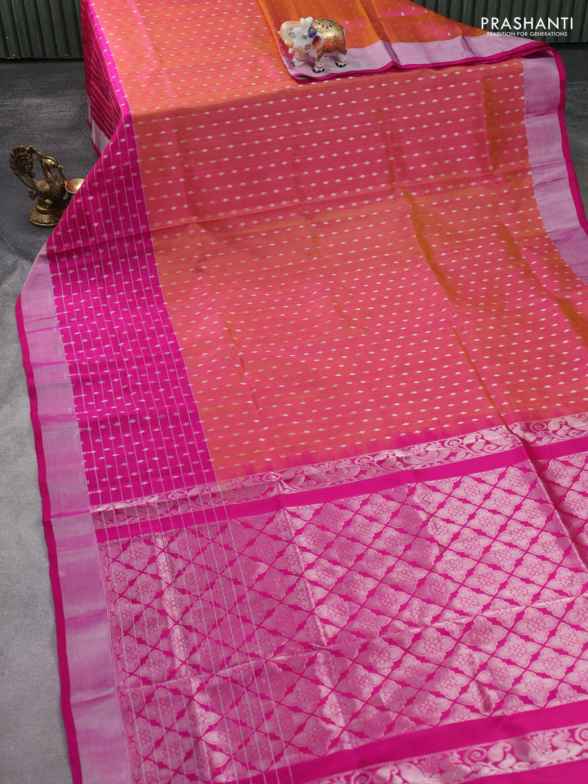 Pure uppada silk saree dual shade of yellowish pink and pink with allover silver zari woven butta weaves and long zari woven border - Image 2