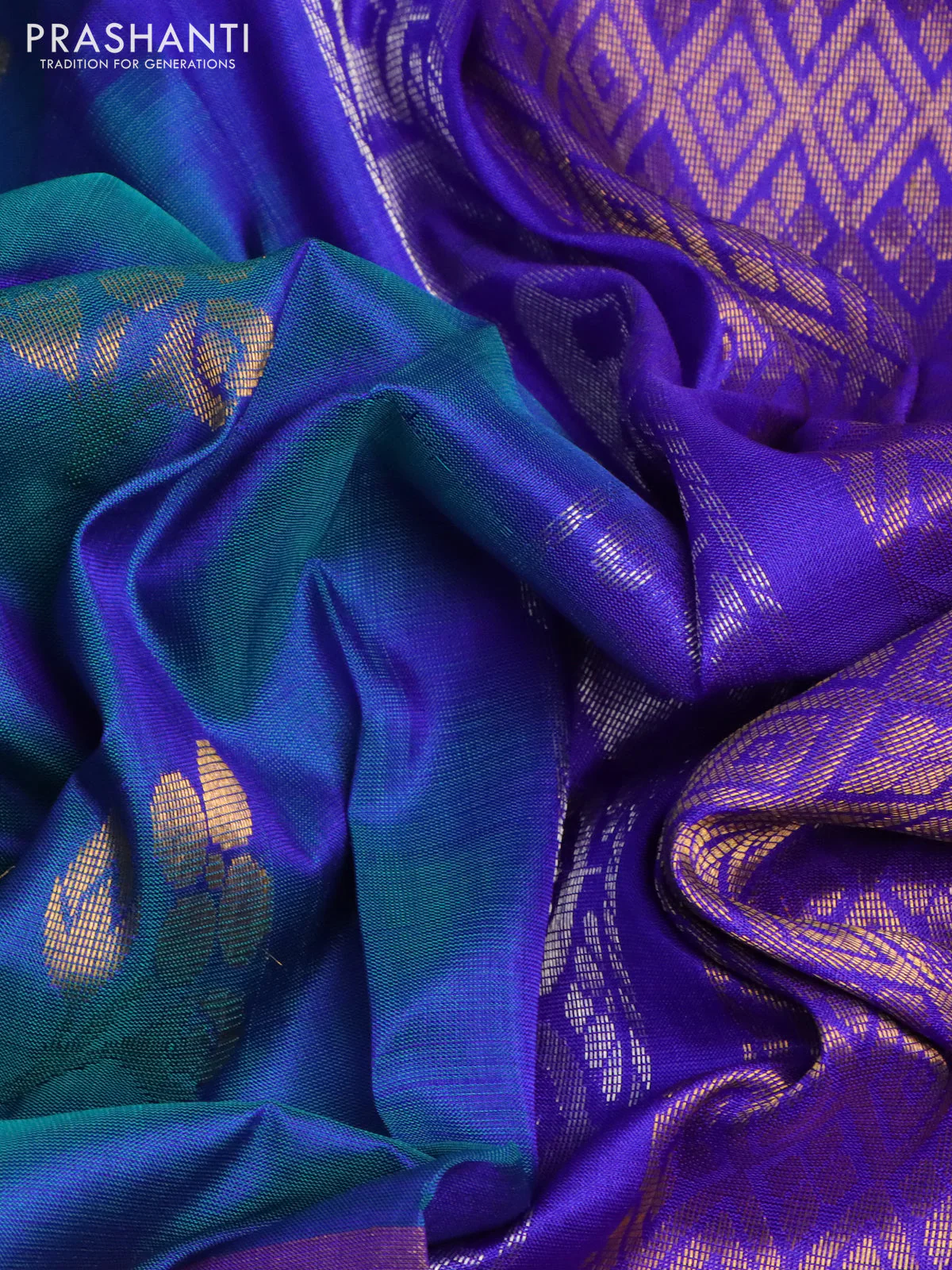 Pure uppada silk saree teal blue and blue with zari woven buttas and long zari woven paisley butta border - Image 3